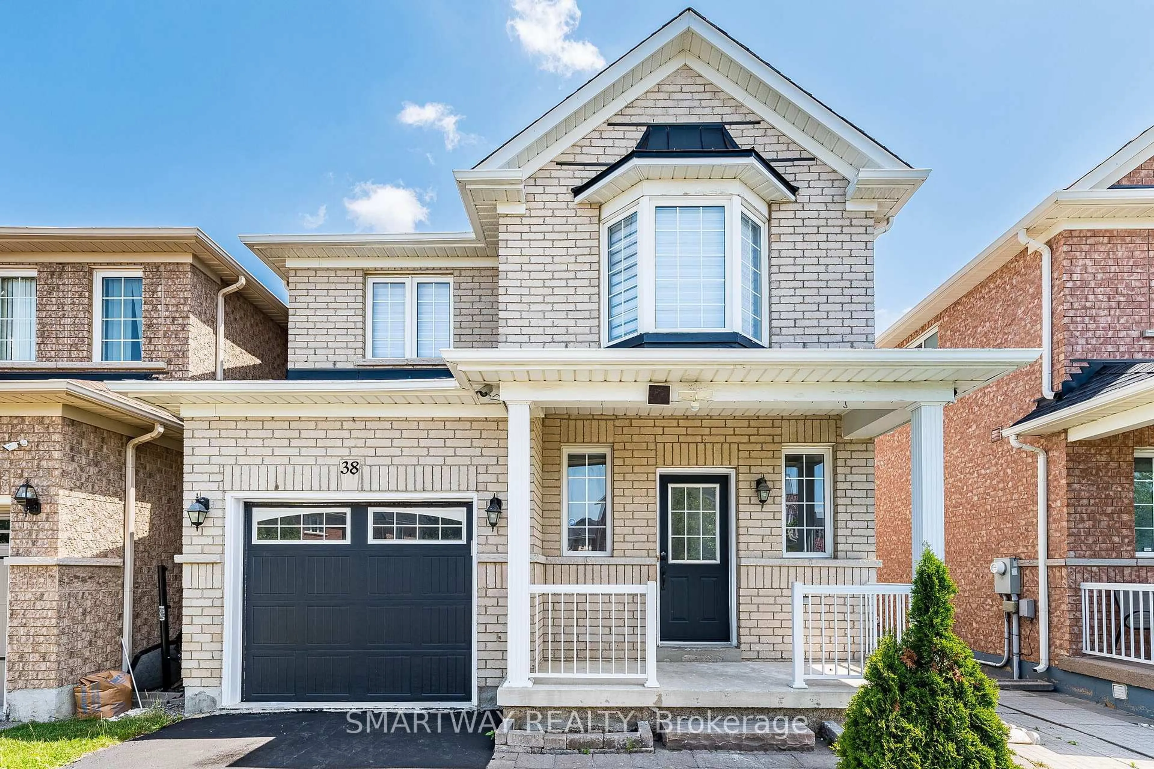 Home with brick exterior material, street for 38 Lockburn Cres, Brampton Ontario L7A 3W7