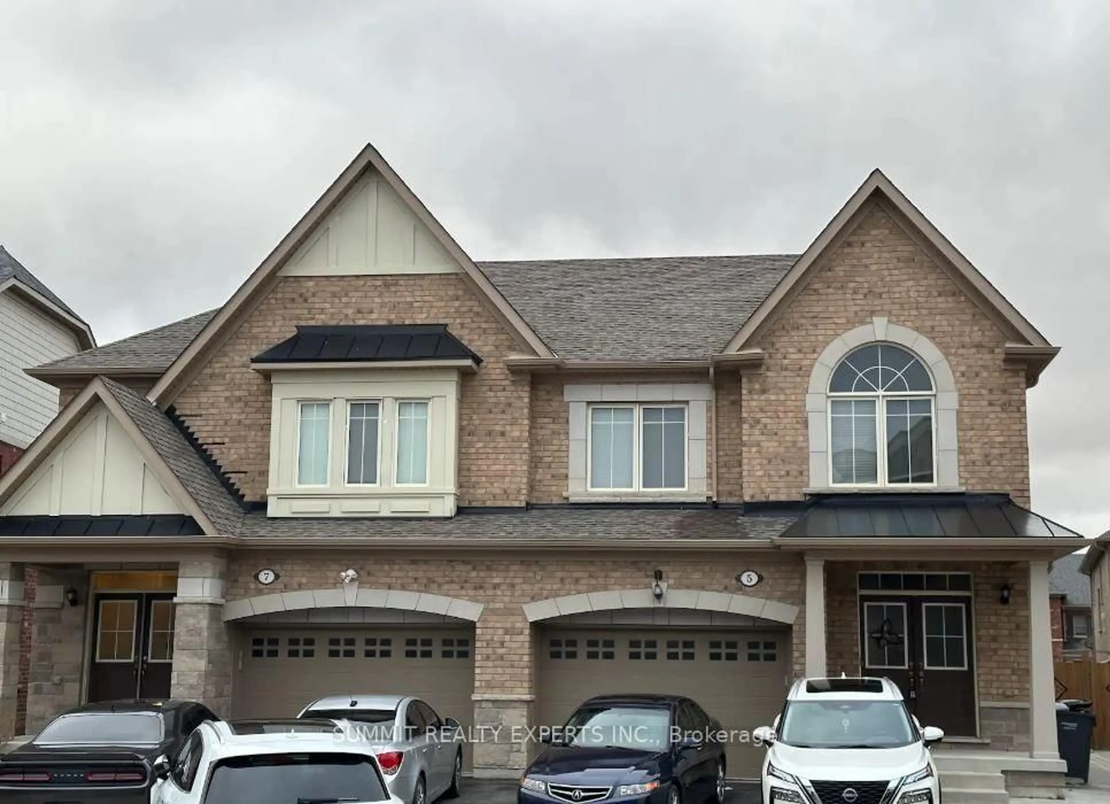 Home with brick exterior material, street for 5 Merrybrook Tr, Brampton Ontario L7A 4W2