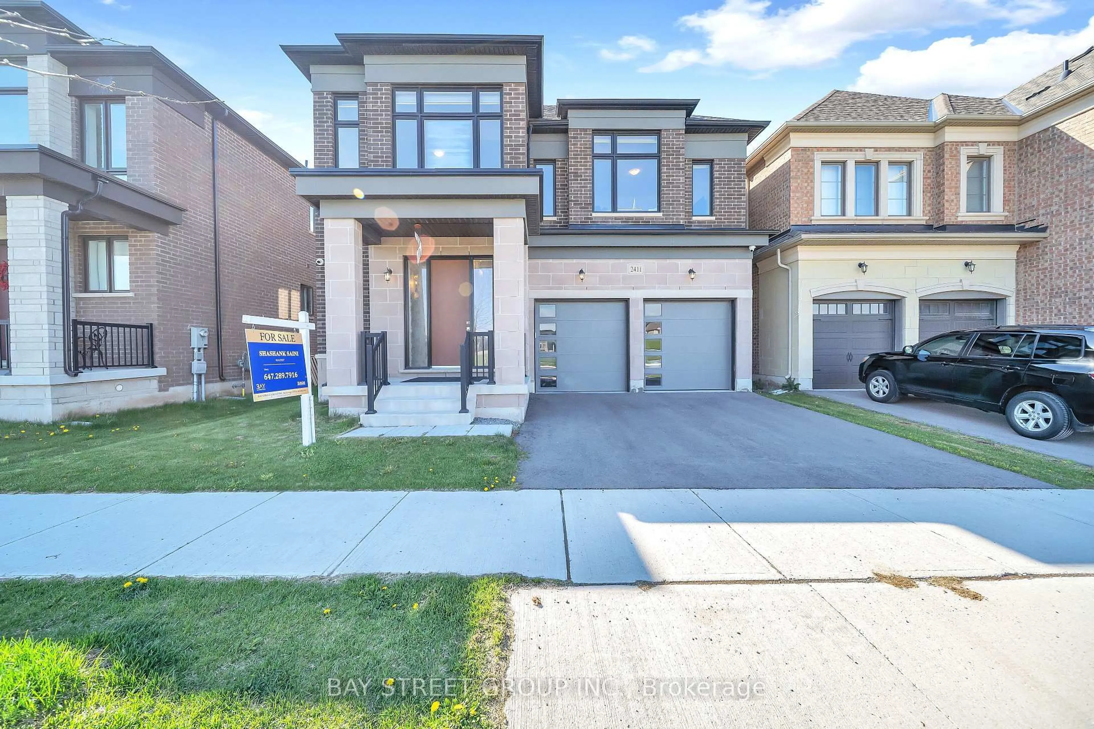 Home with brick exterior material, street for 2411 Saw Whet Blvd, Oakville Ontario L6M 5L5