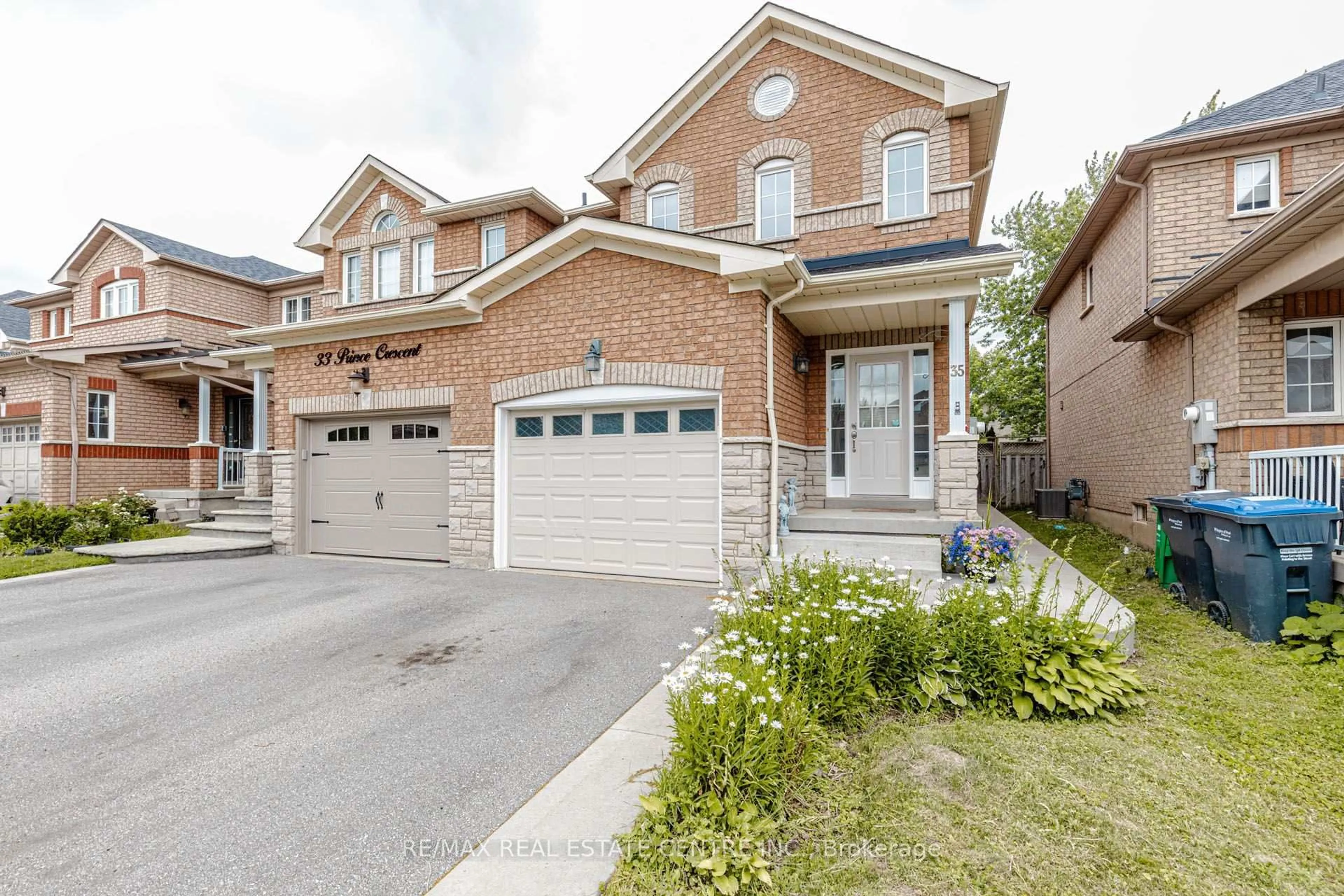 Home with brick exterior material, street for 35 Prince Cres, Brampton Ontario L7A 2C8
