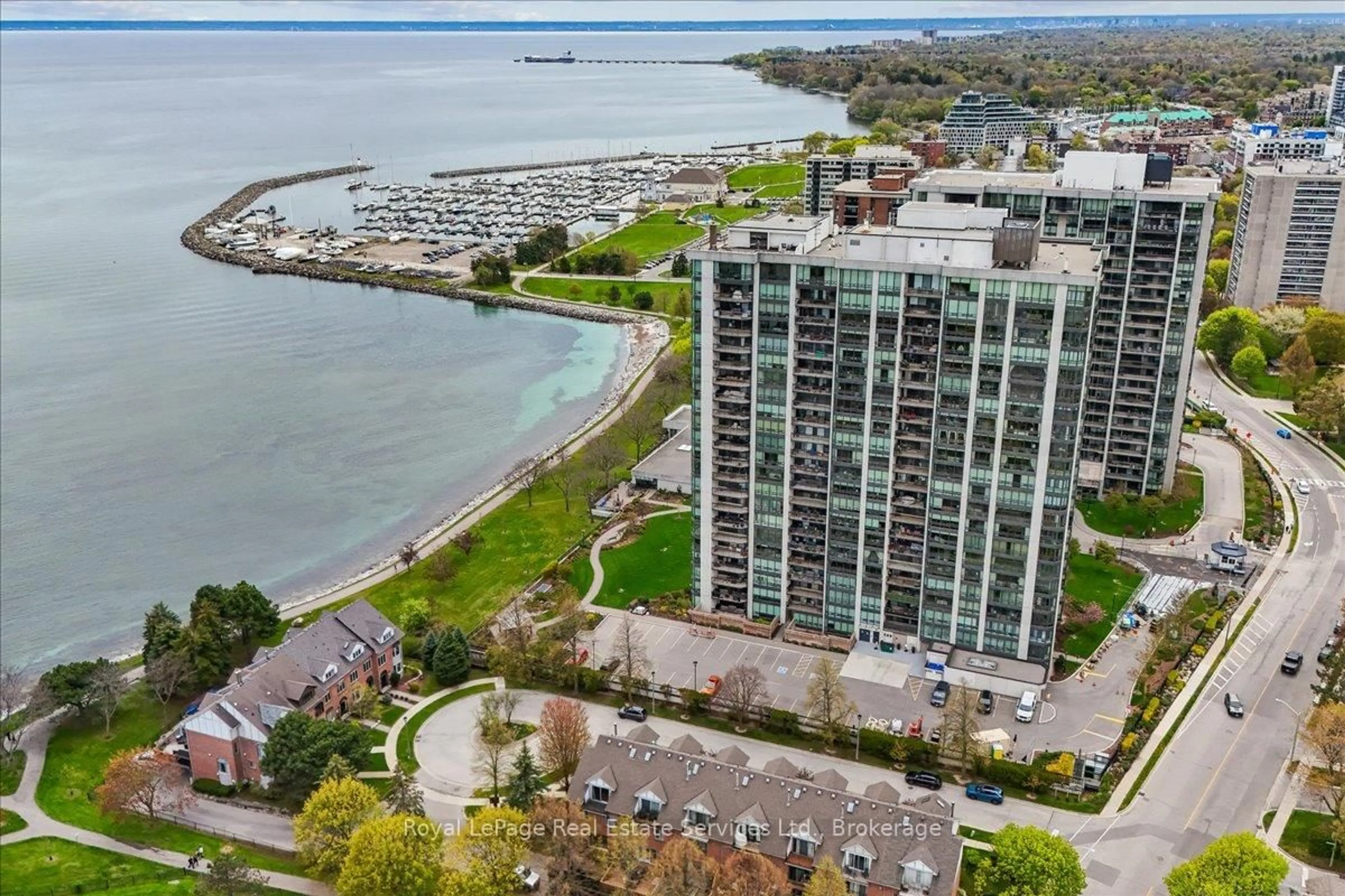 A pic from outside/outdoor area/front of a property/back of a property/a pic from drone, water/lake/river/ocean view for 2170 Marine Dr #506, Oakville Ontario L6L 5V1