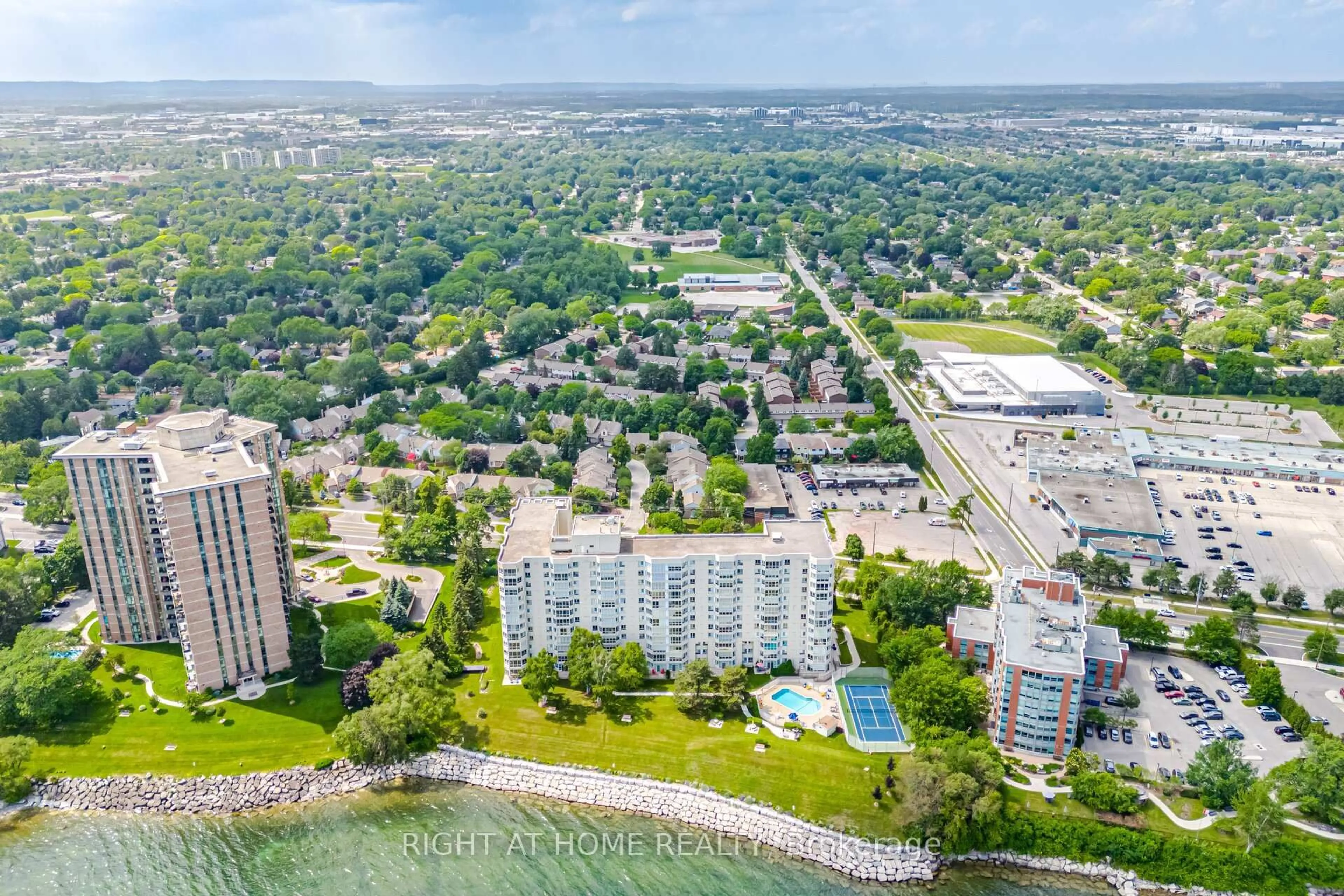 A pic from outside/outdoor area/front of a property/back of a property/a pic from drone, water/lake/river/ocean view for 5280 Lakeshore Rd #1104, Burlington Ontario L7L 5R1
