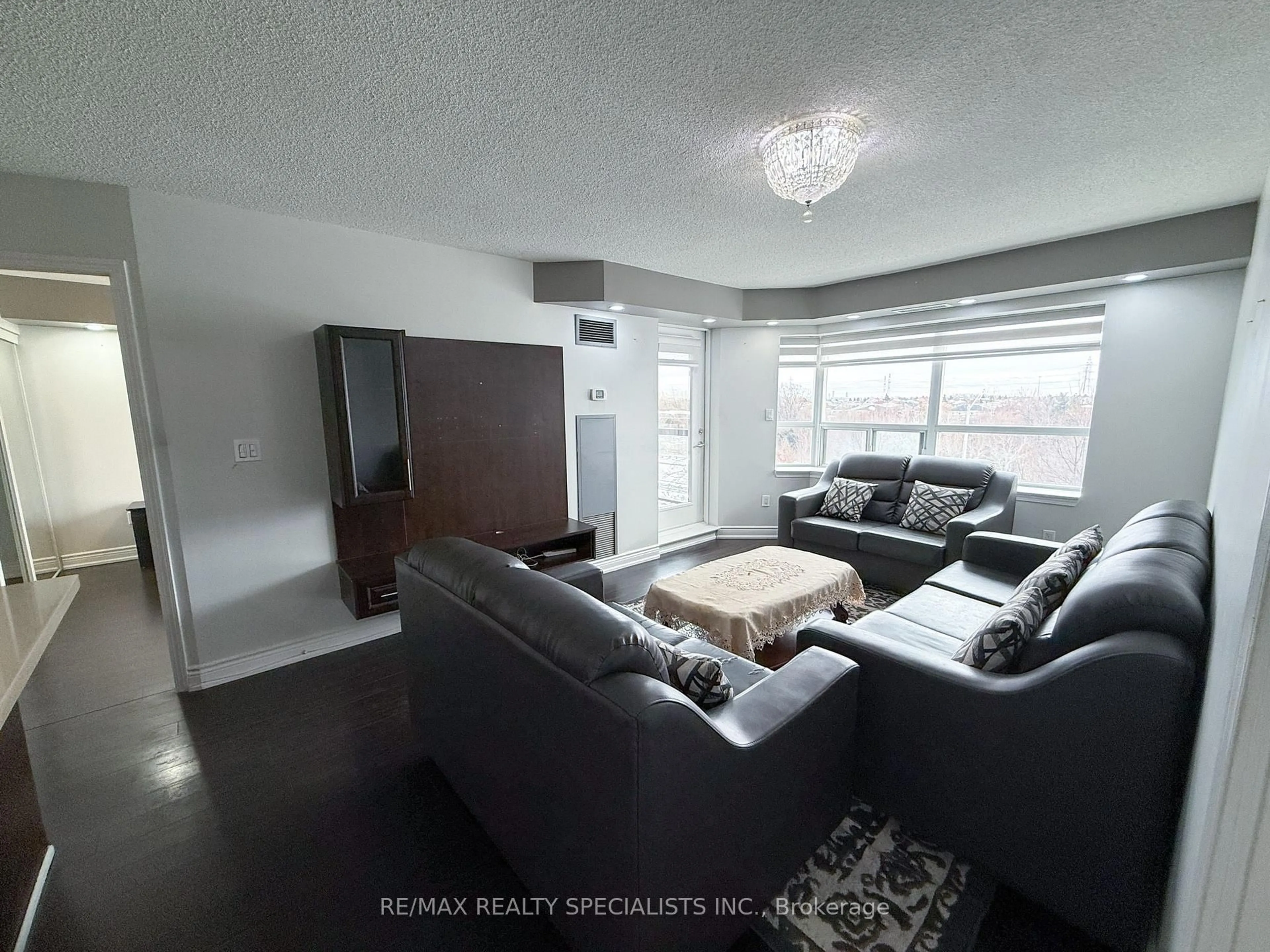 Living room with furniture, unknown for 300 Ray Lawson Blvd #403, Brampton Ontario L6Y 5H5