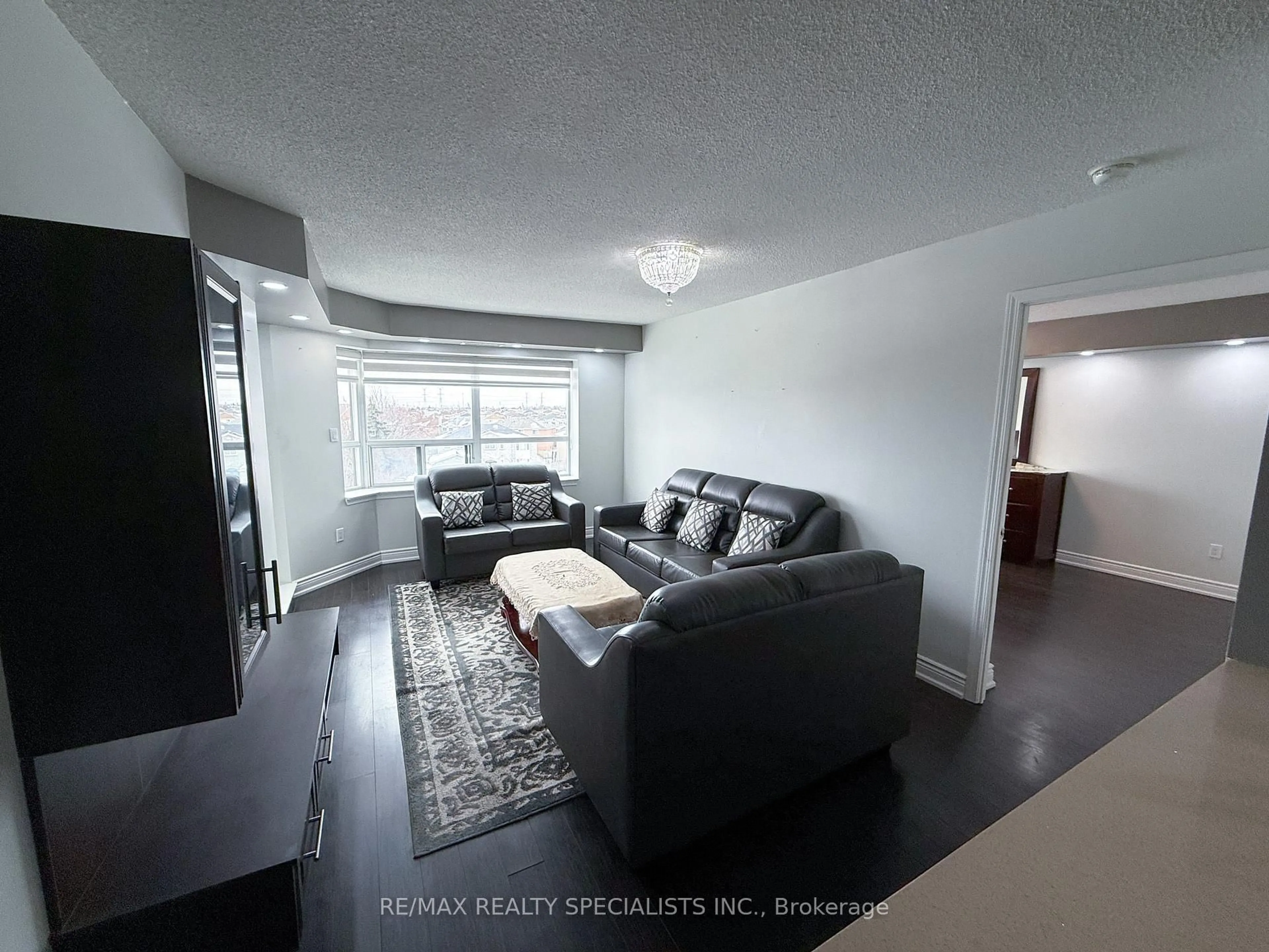 Living room with furniture, unknown for 300 Ray Lawson Blvd #403, Brampton Ontario L6Y 5H5