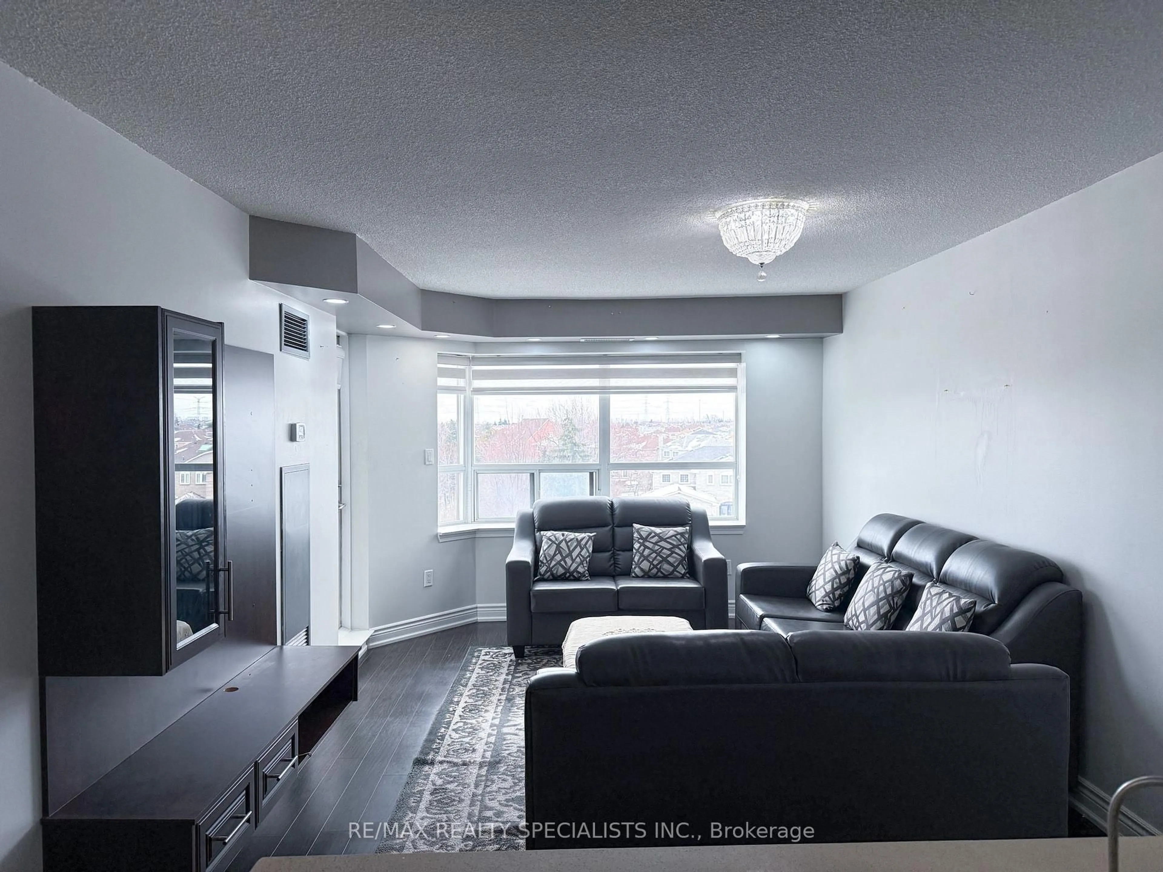 Living room with furniture, unknown for 300 Ray Lawson Blvd #403, Brampton Ontario L6Y 5H5