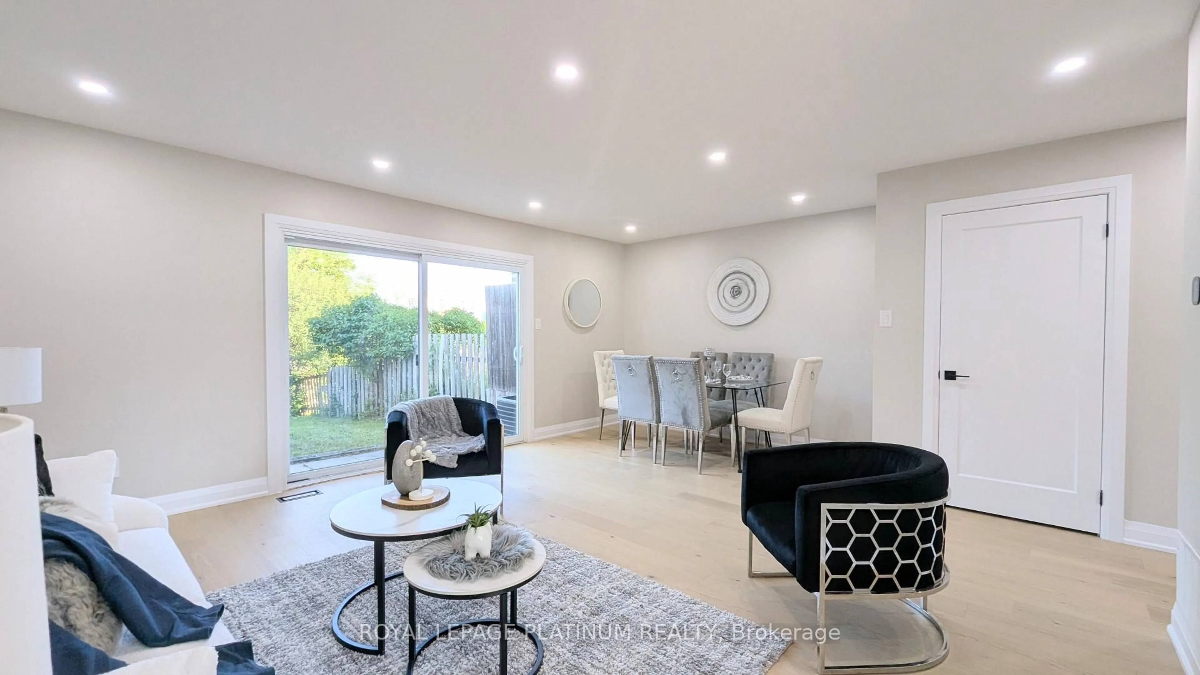 Living room with furniture, ceramic/tile floor for 33 Greene Dr, Brampton Ontario L6V 2P2