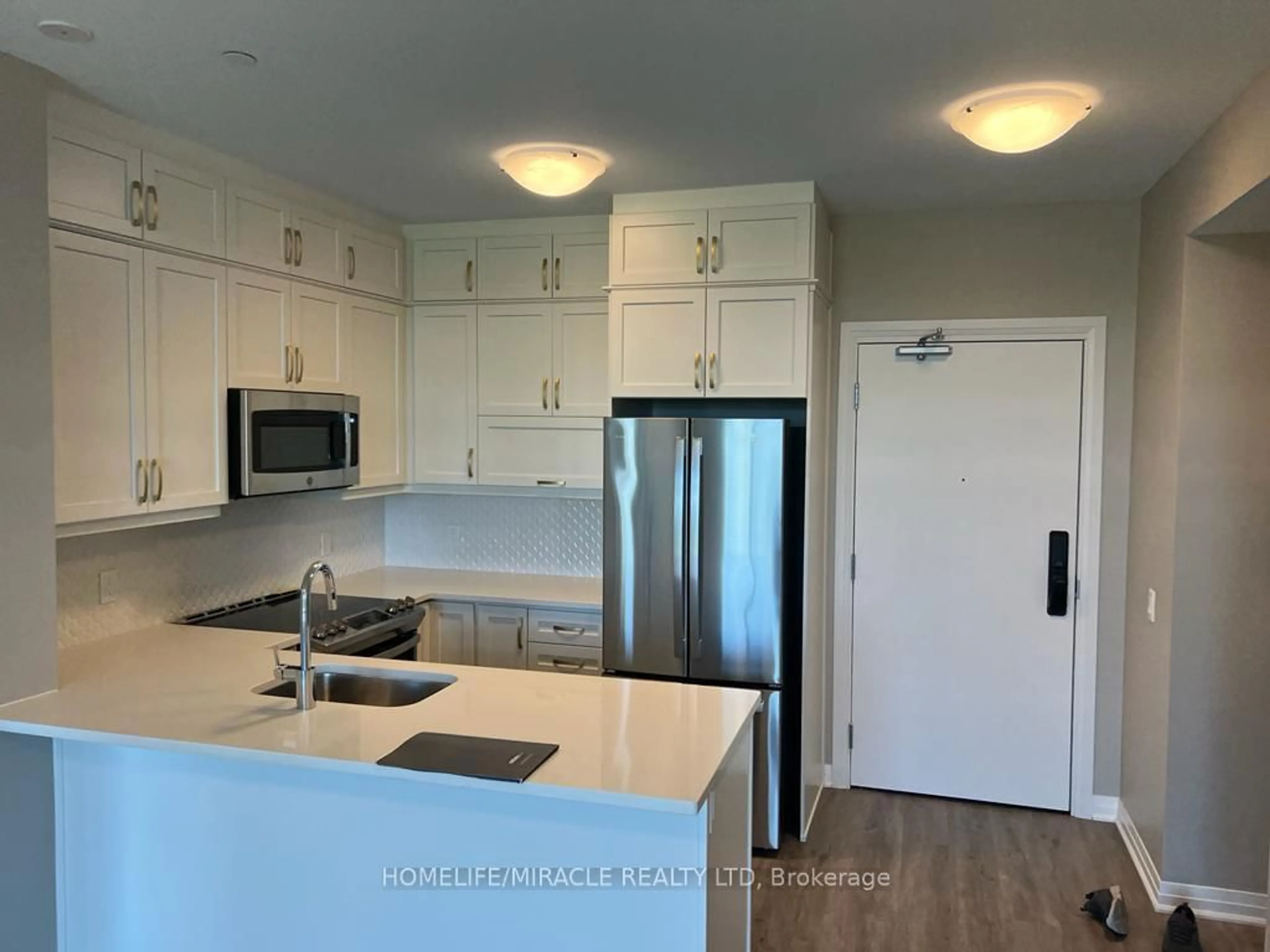 Open concept kitchen, unknown for 95 Dundas Street West #219, Oakville Ontario L6M 5N4