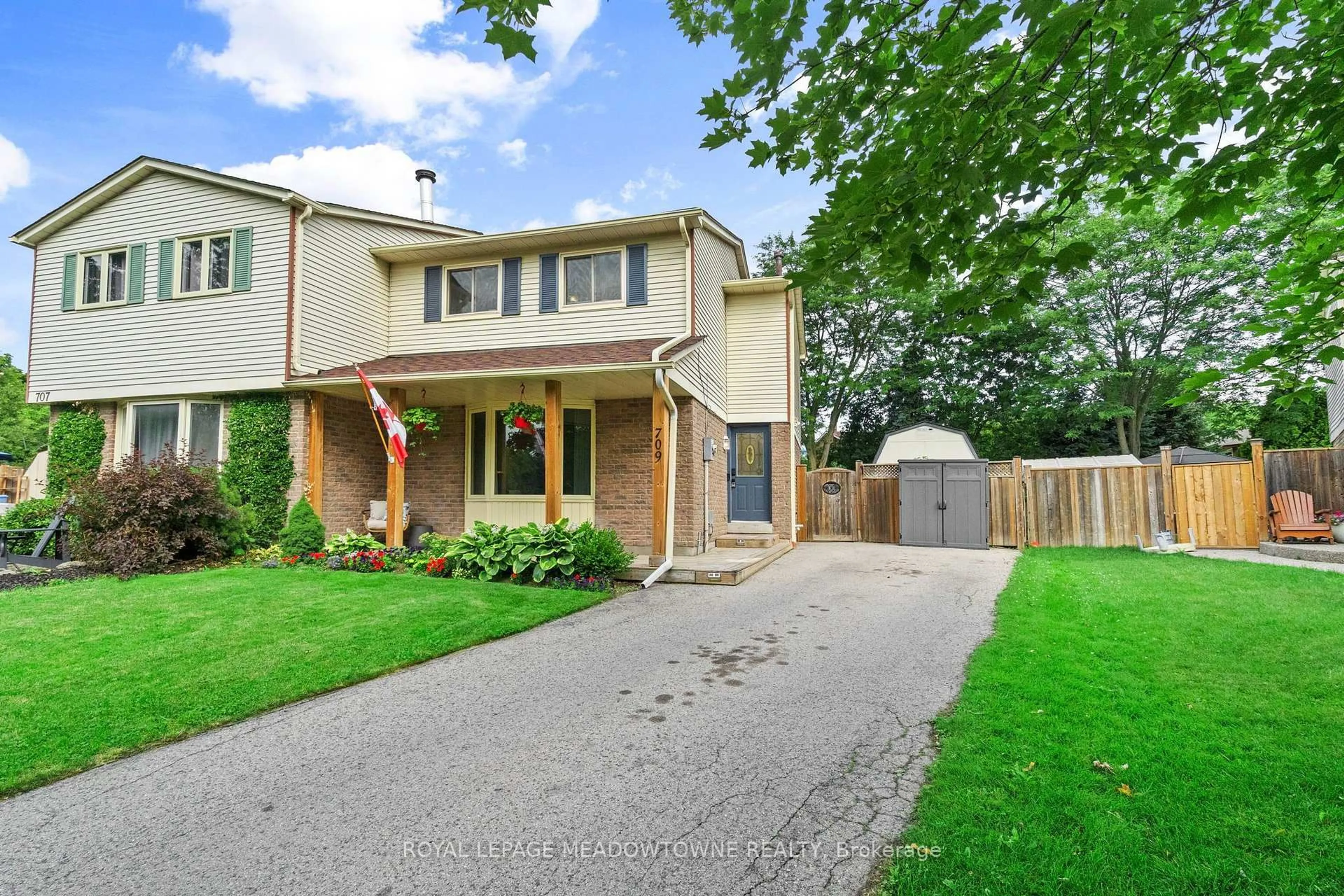 Home with brick exterior material, street for 709 Middleton Cres, Milton Ontario L9T 4C2