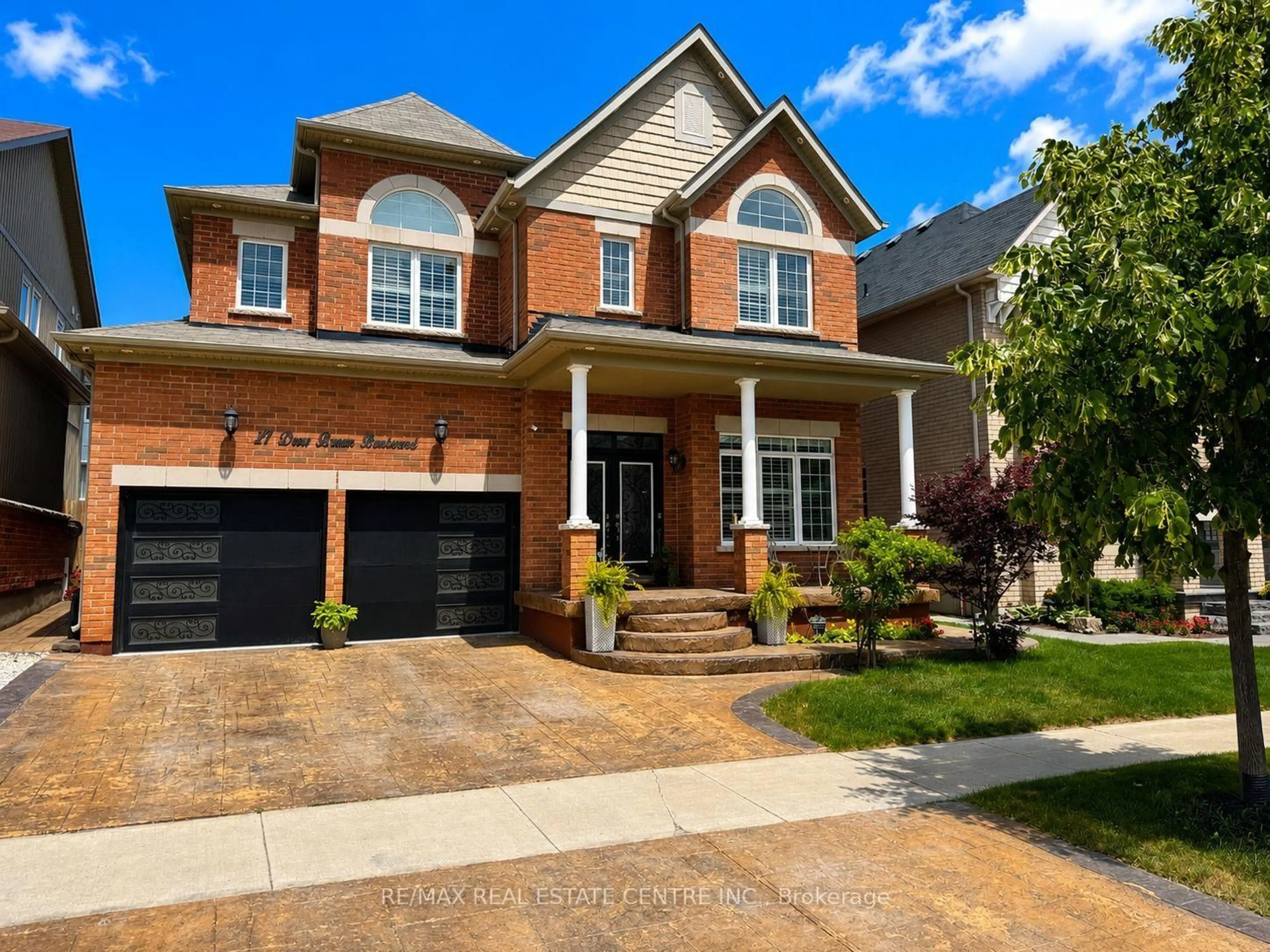 Home with brick exterior material, street for 27 Drew Brown Blvd, Orangeville Ontario L9W 6Z4