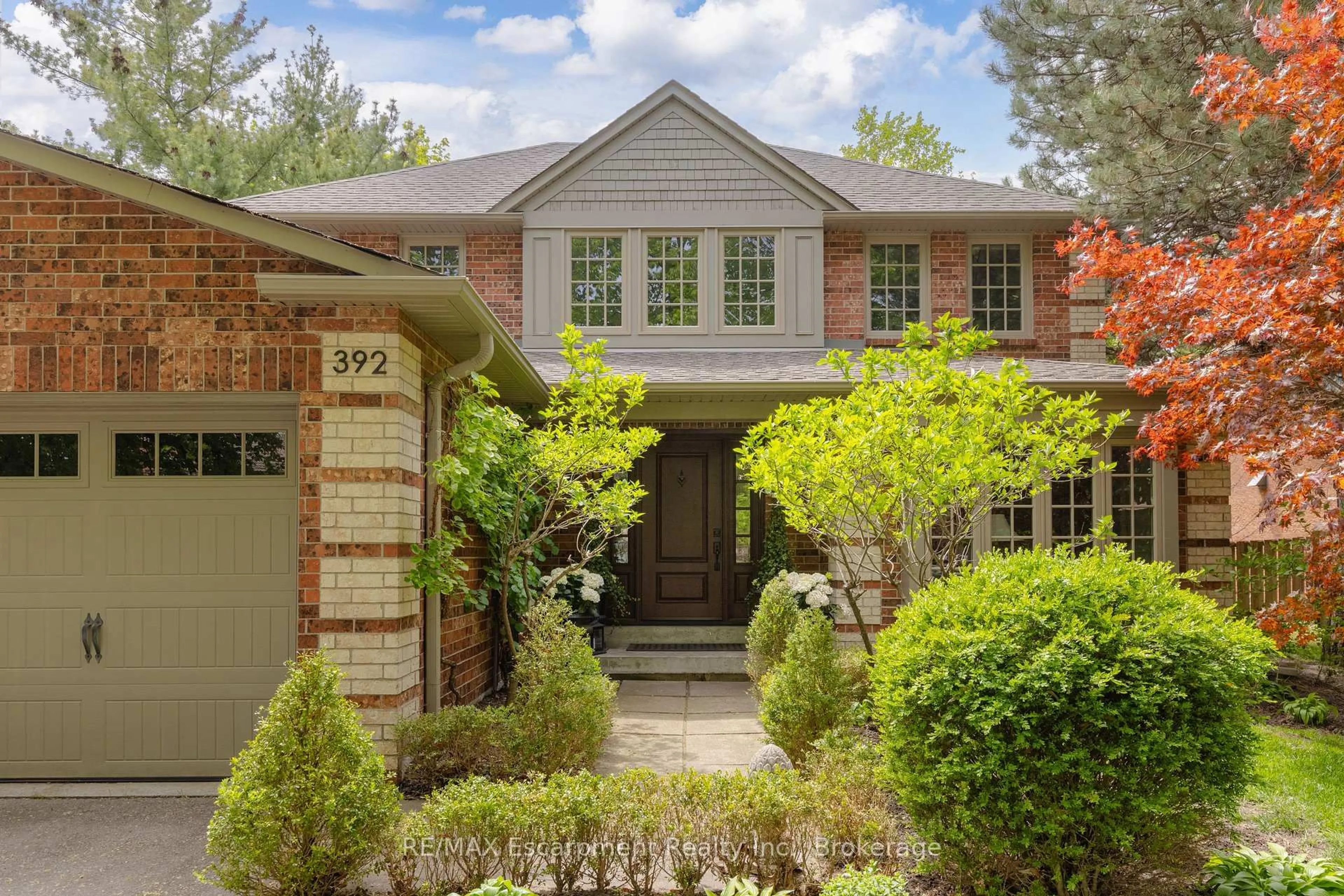 Home with brick exterior material, street for 392 Aspen Forest Dr, Oakville Ontario L6J 6H5
