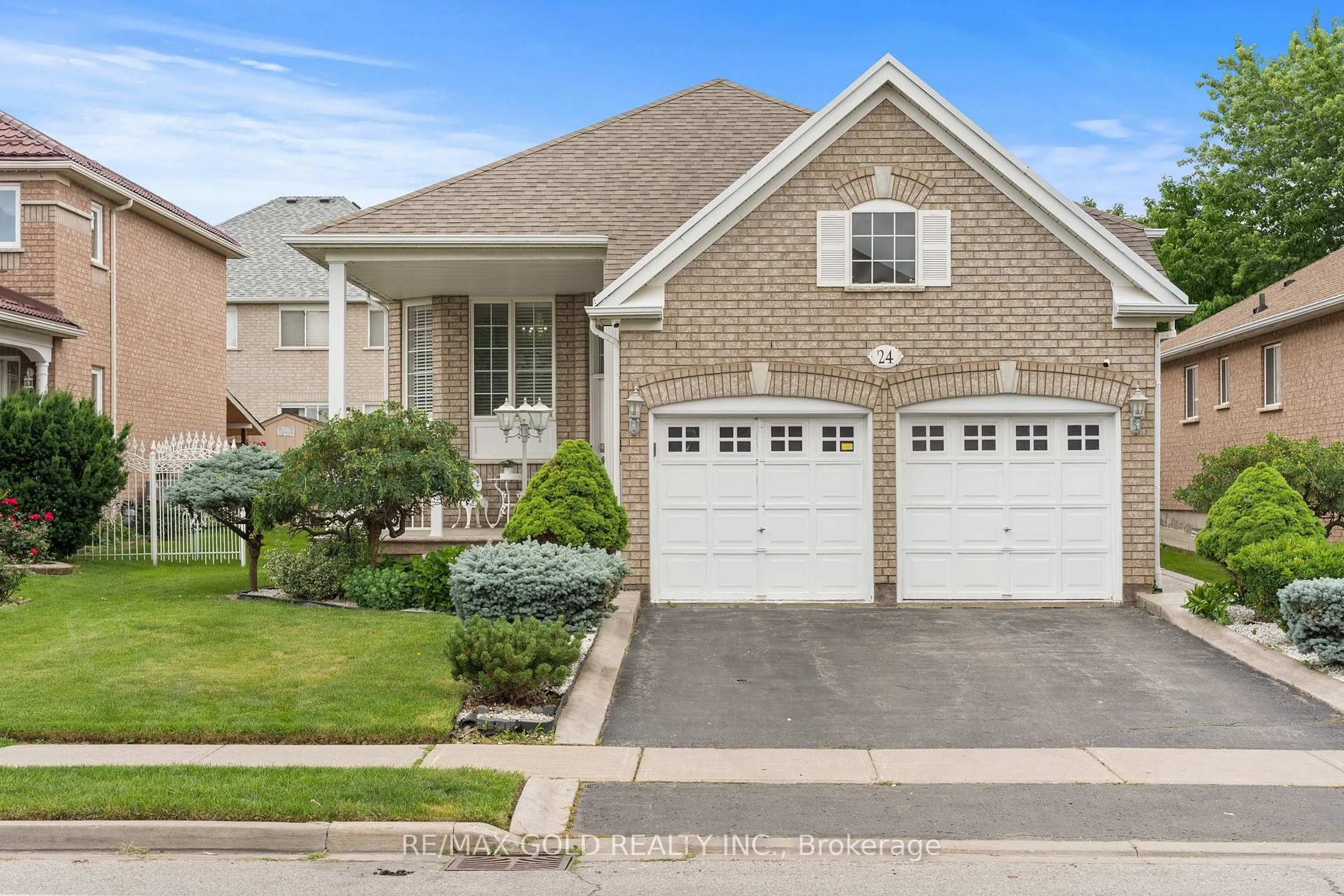 Home with brick exterior material, street for 24 Fletchers Creek Blvd, Brampton Ontario L6X 4R6