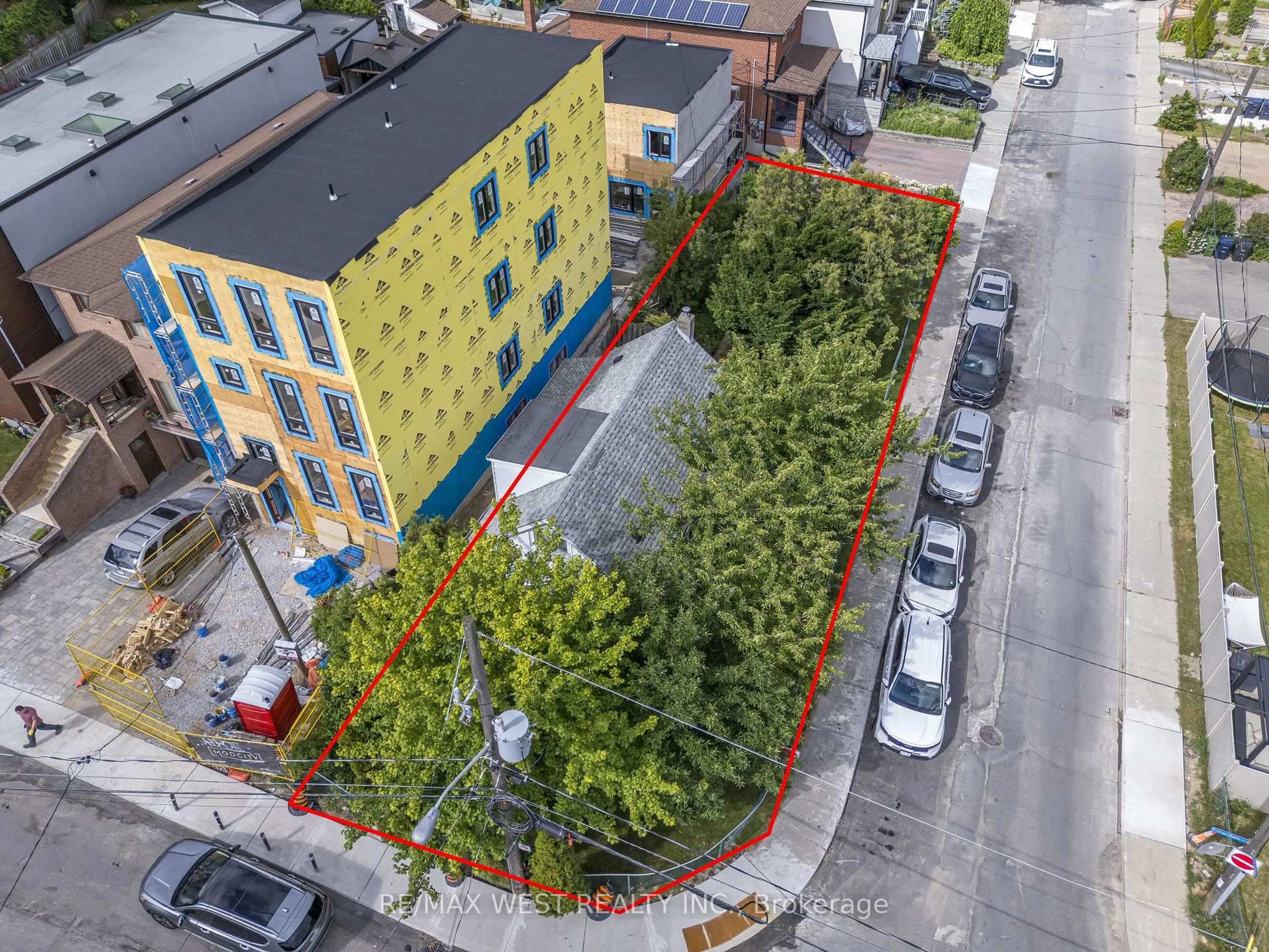 A pic from outside/outdoor area/front of a property/back of a property/a pic from drone, street for 48 Ennerdale Rd, Toronto Ontario M6E 4C3