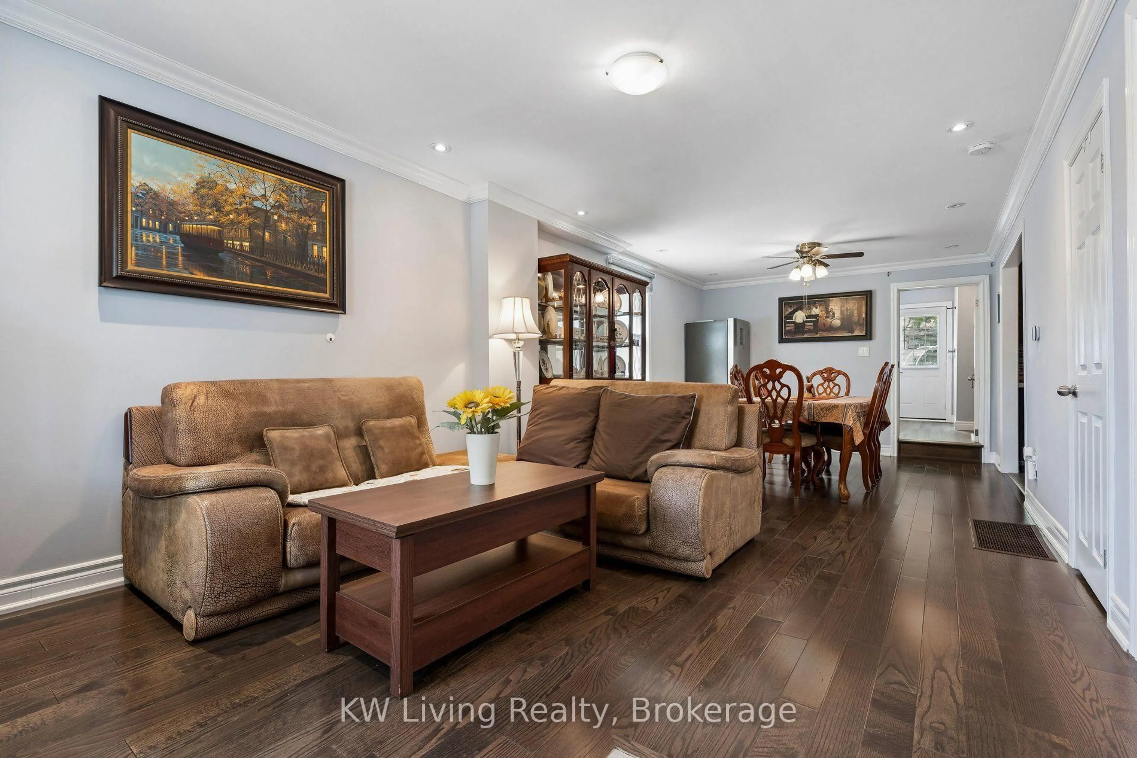 Living room with furniture, wood/laminate floor for 116 Seventh St, Toronto Ontario M8V 3B4