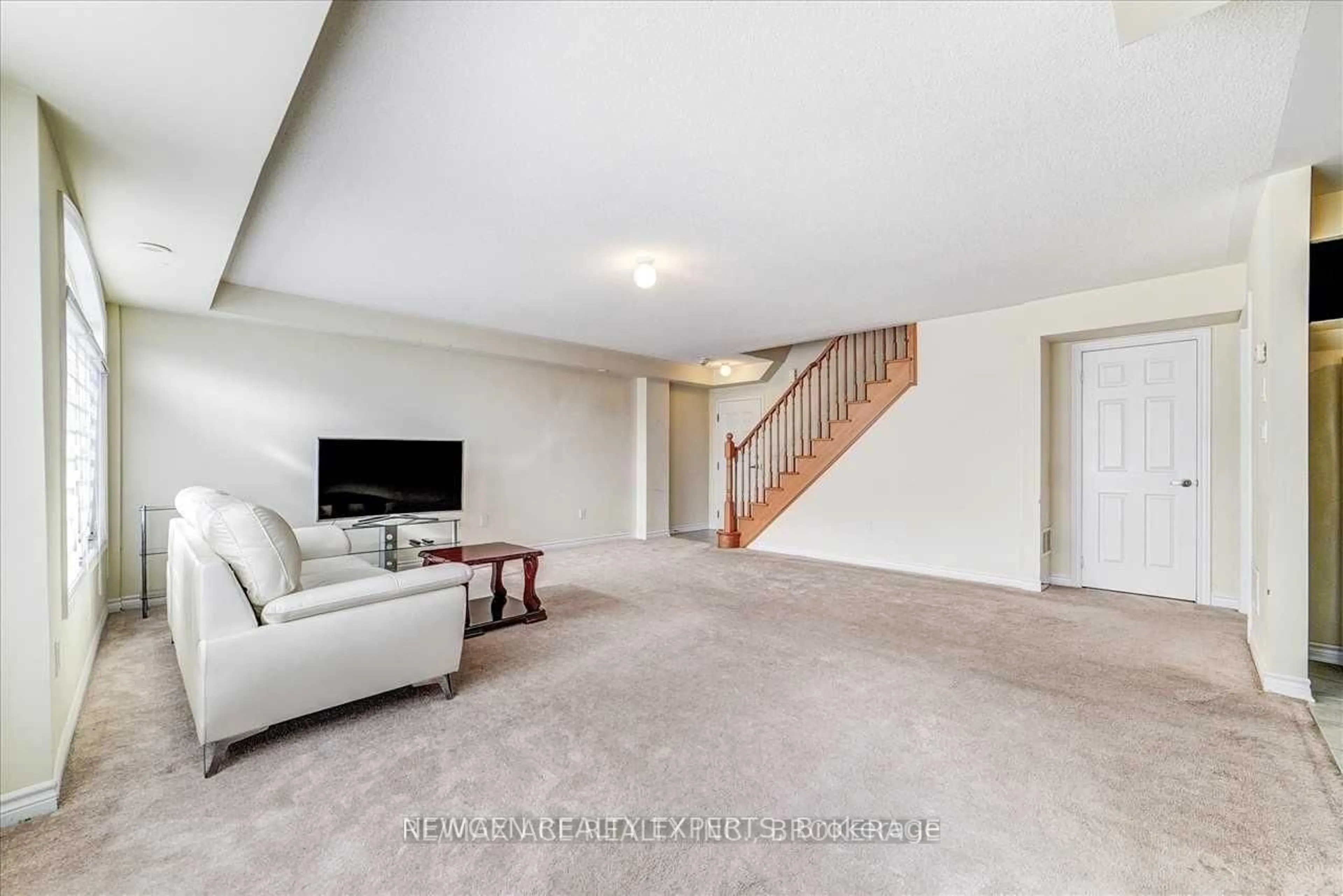 Living room with furniture, carpet floor for 200 Veterans Dr #16, Brampton Ontario L7A 5K7