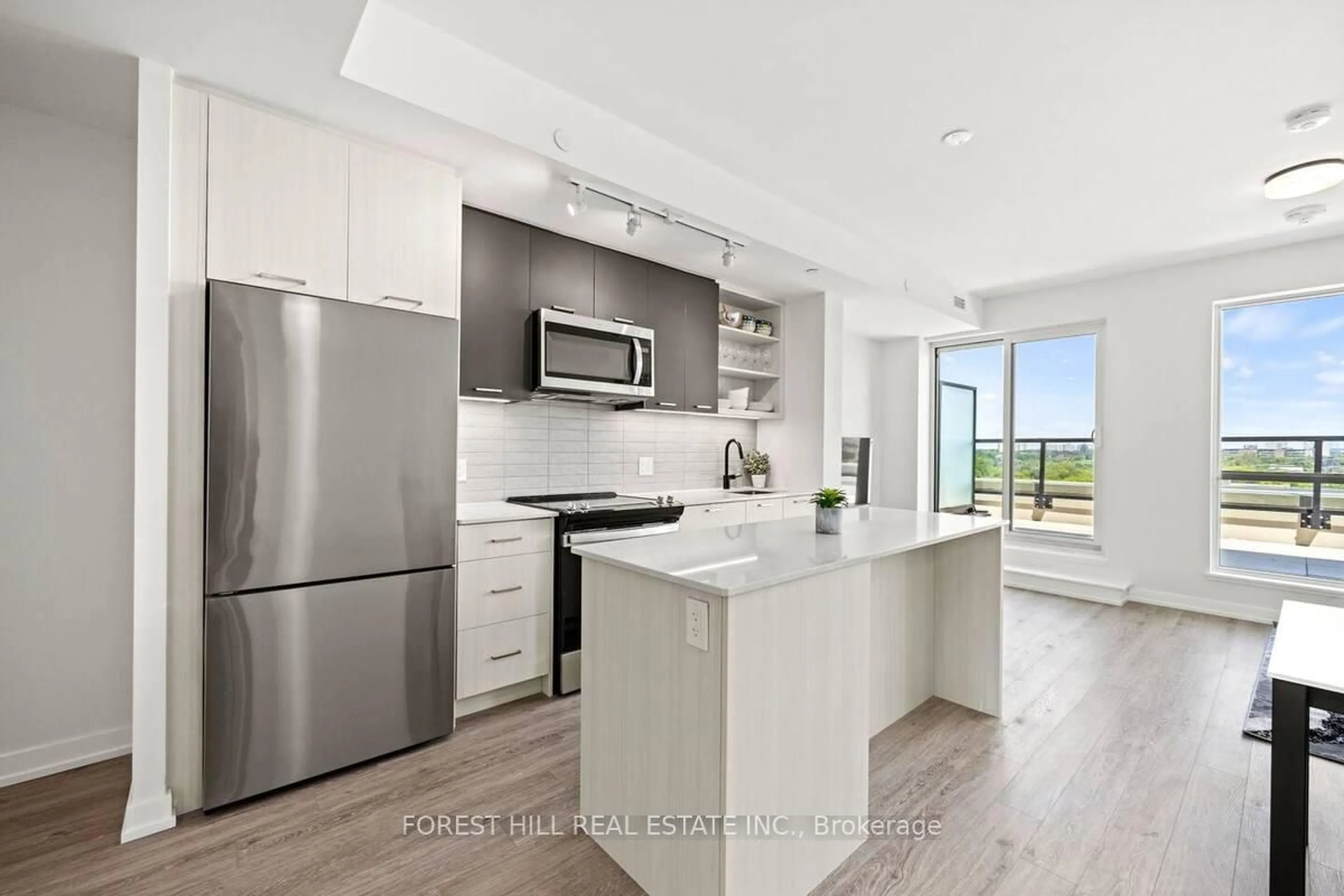 Open concept kitchen, ceramic/tile floor for 2300 St. Clair Ave #717, Toronto Ontario M6N 0B3