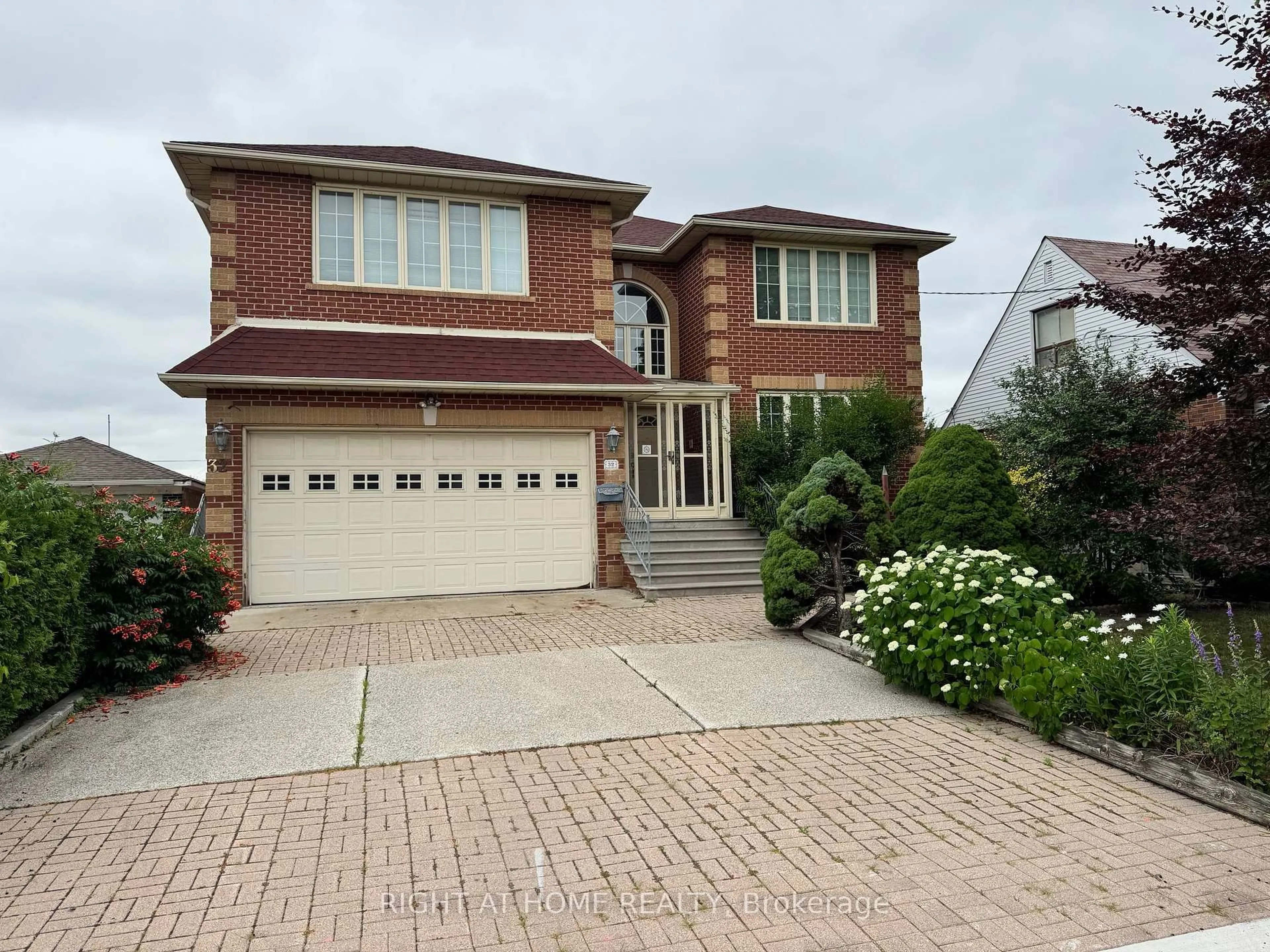 Home with brick exterior material, street for 32 Creston Rd, Toronto Ontario M6A 1J1