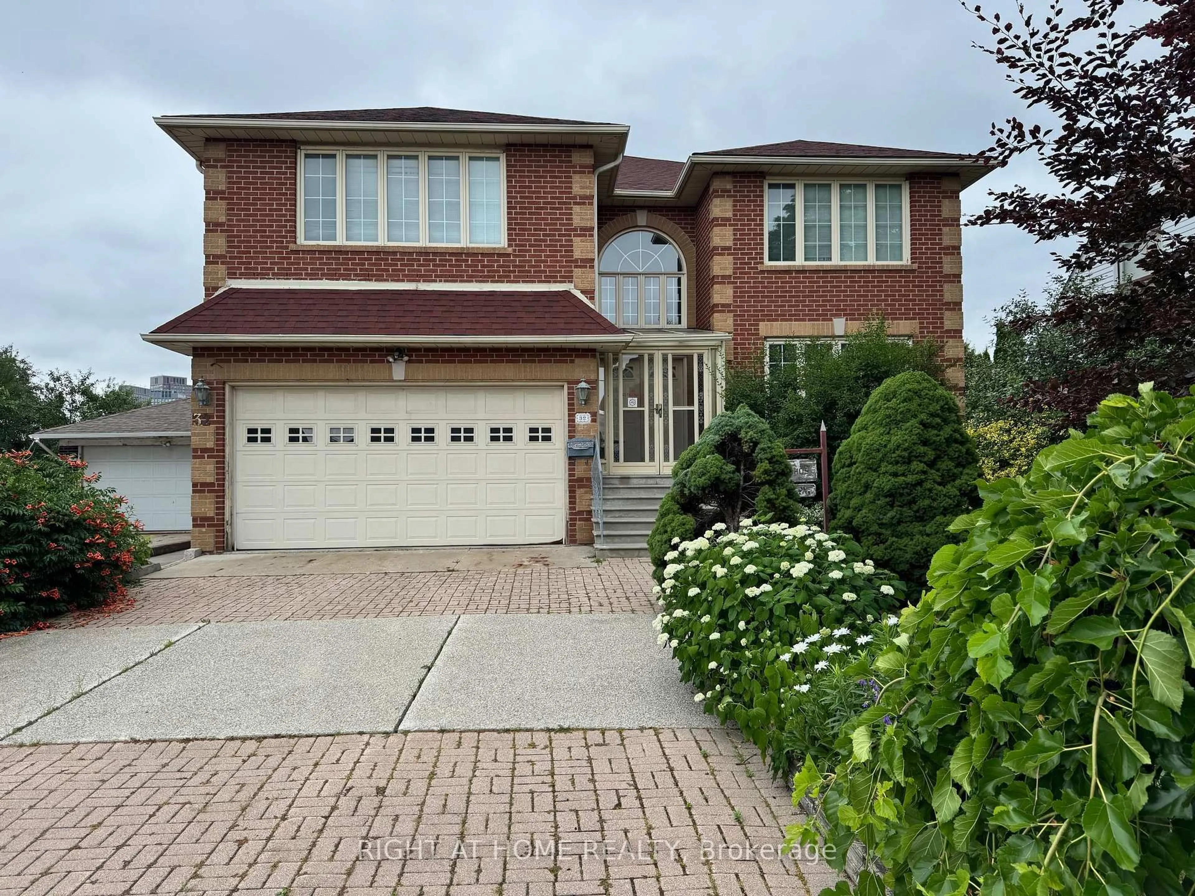 Home with brick exterior material, street for 32 Creston Rd, Toronto Ontario M6A 1J1