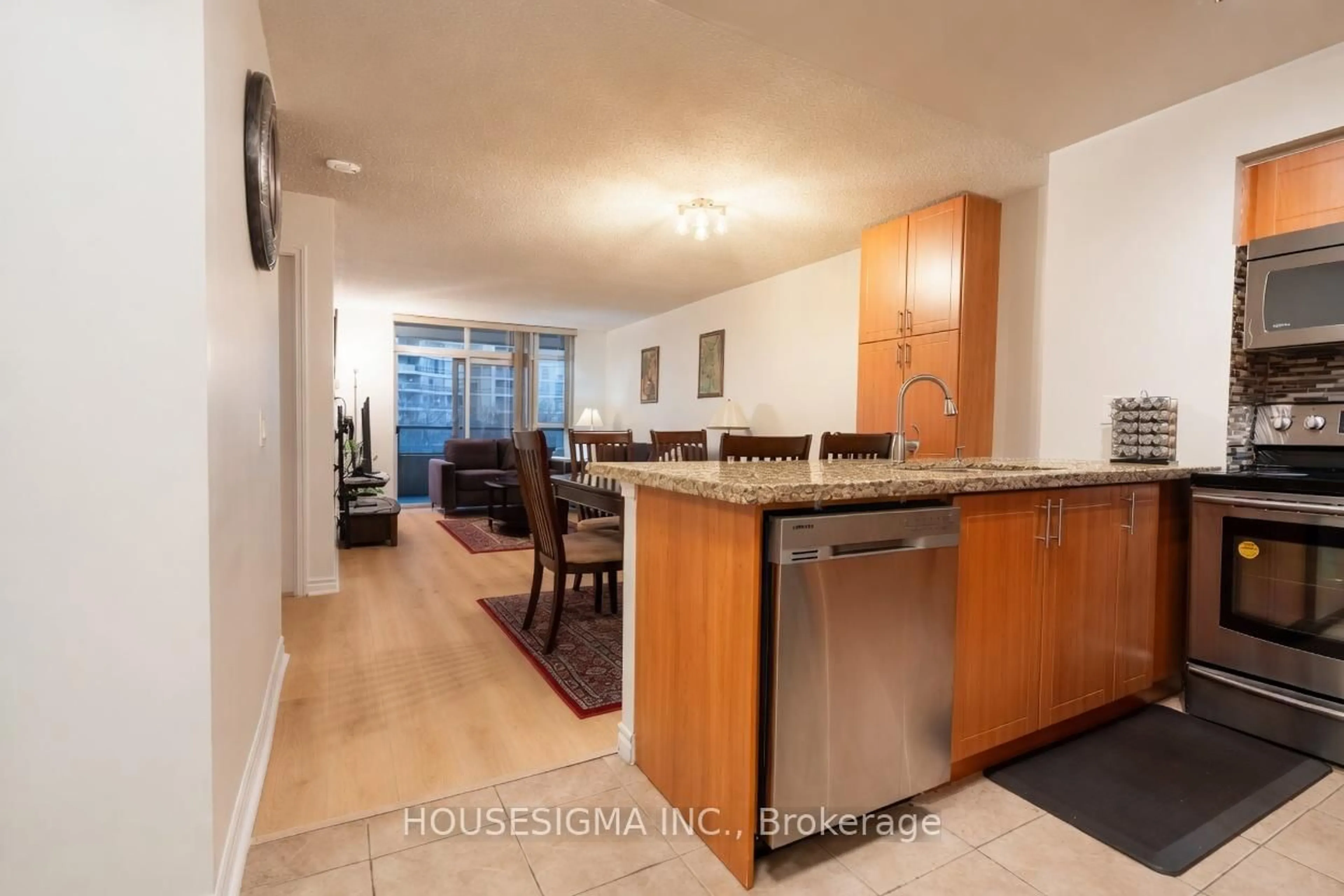 Open concept kitchen, unknown for 35 Kingsbridge Garden Circ #513, Mississauga Ontario L5R 3Z5