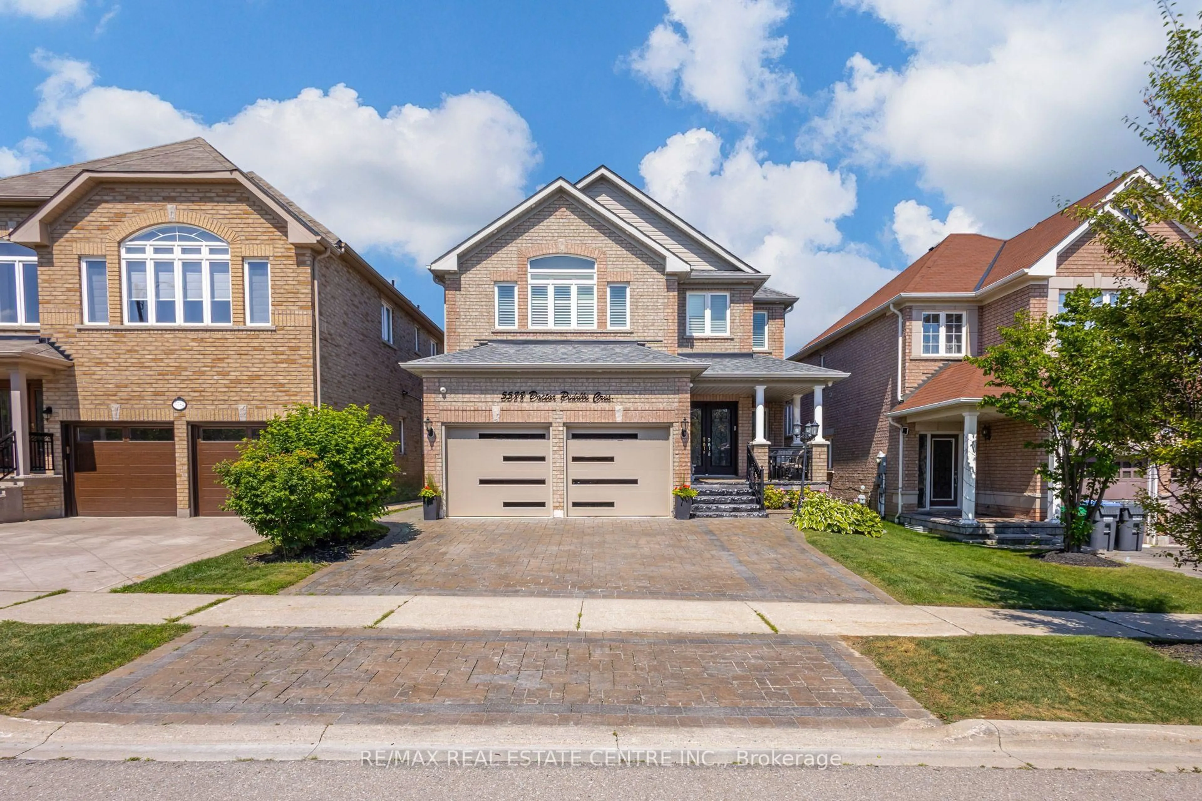 Home with brick exterior material, street for 5588 Doctor Peddle Cres, Mississauga Ontario L5M 0K6