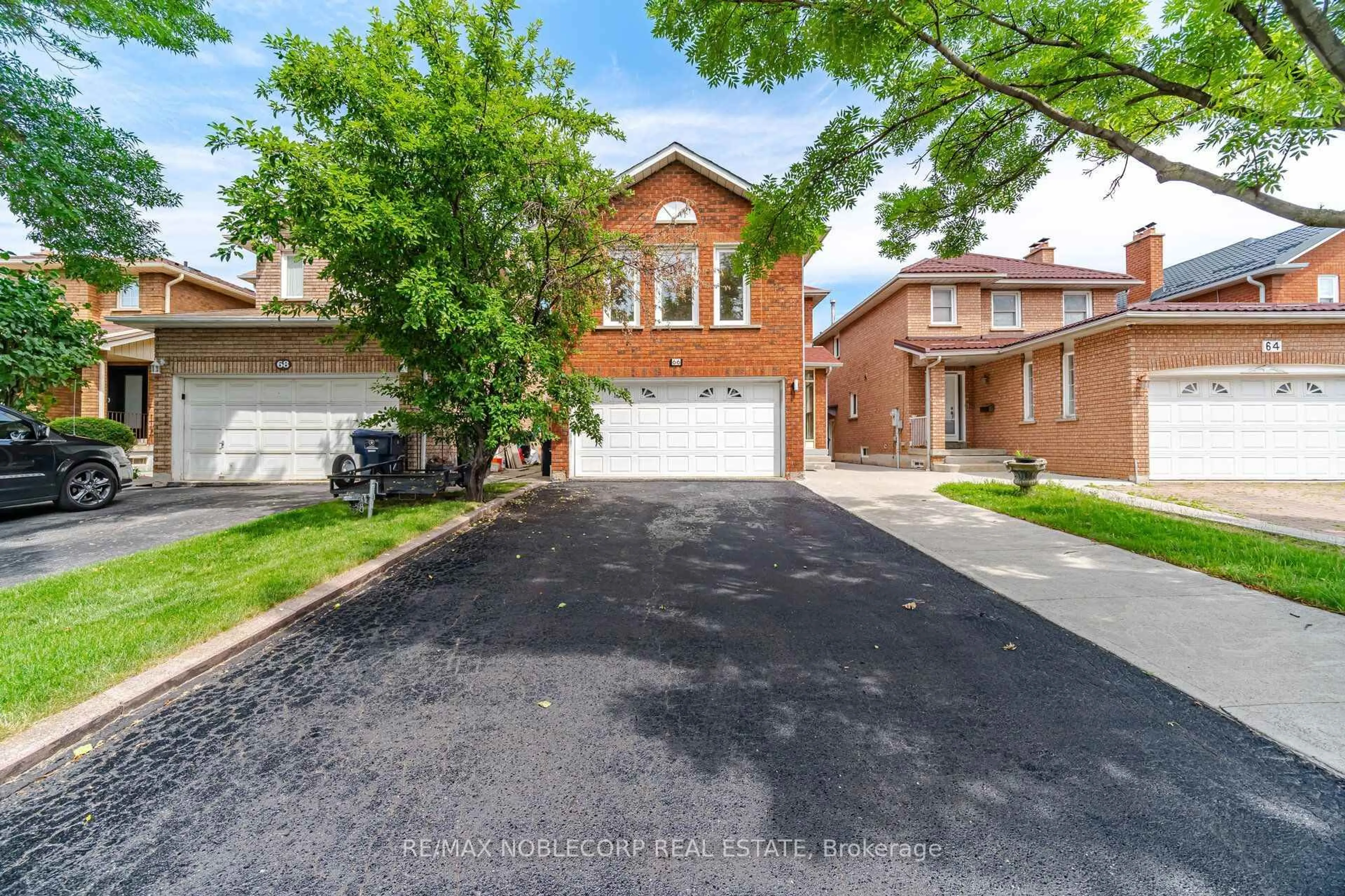Home with brick exterior material, street for 66 Cinrickbar Dr, Toronto Ontario M9W 6X3