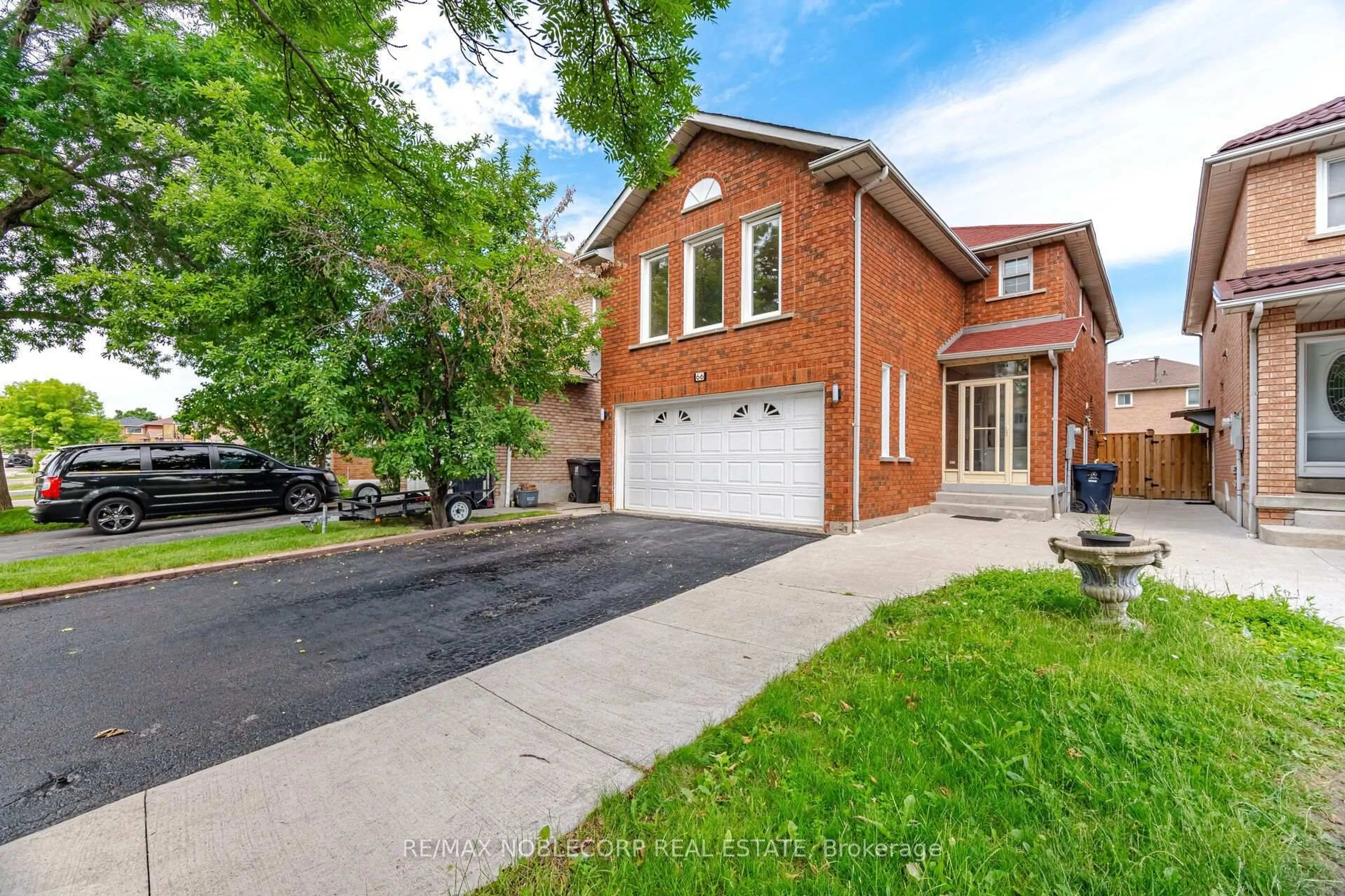 Home with brick exterior material, street for 66 Cinrickbar Dr, Toronto Ontario M9W 6X3