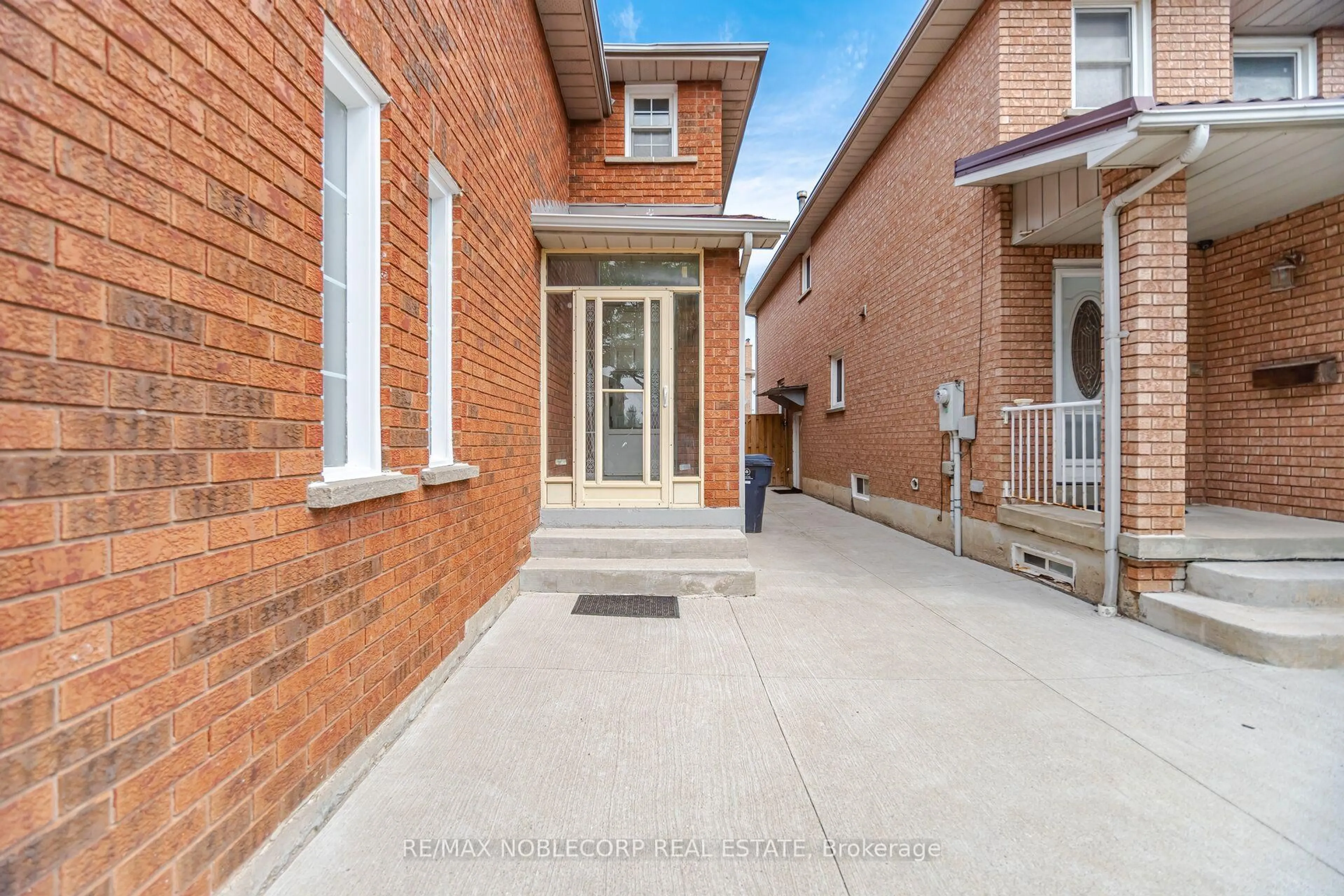 Home with brick exterior material, street for 66 Cinrickbar Dr, Toronto Ontario M9W 6X3
