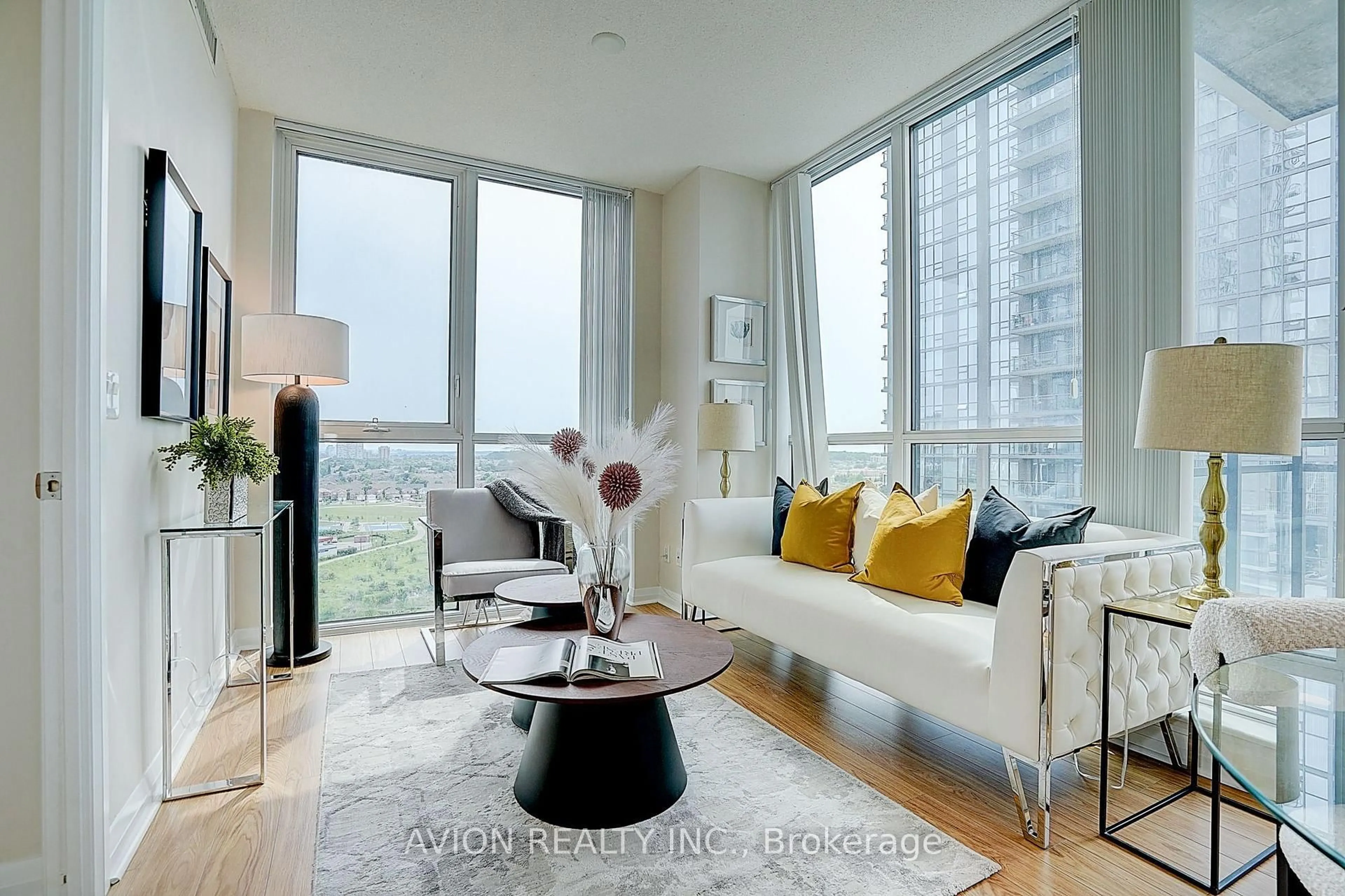 Living room with furniture, unknown for 55 Eglinton Ave #1202, Mississauga Ontario L5R 0E5
