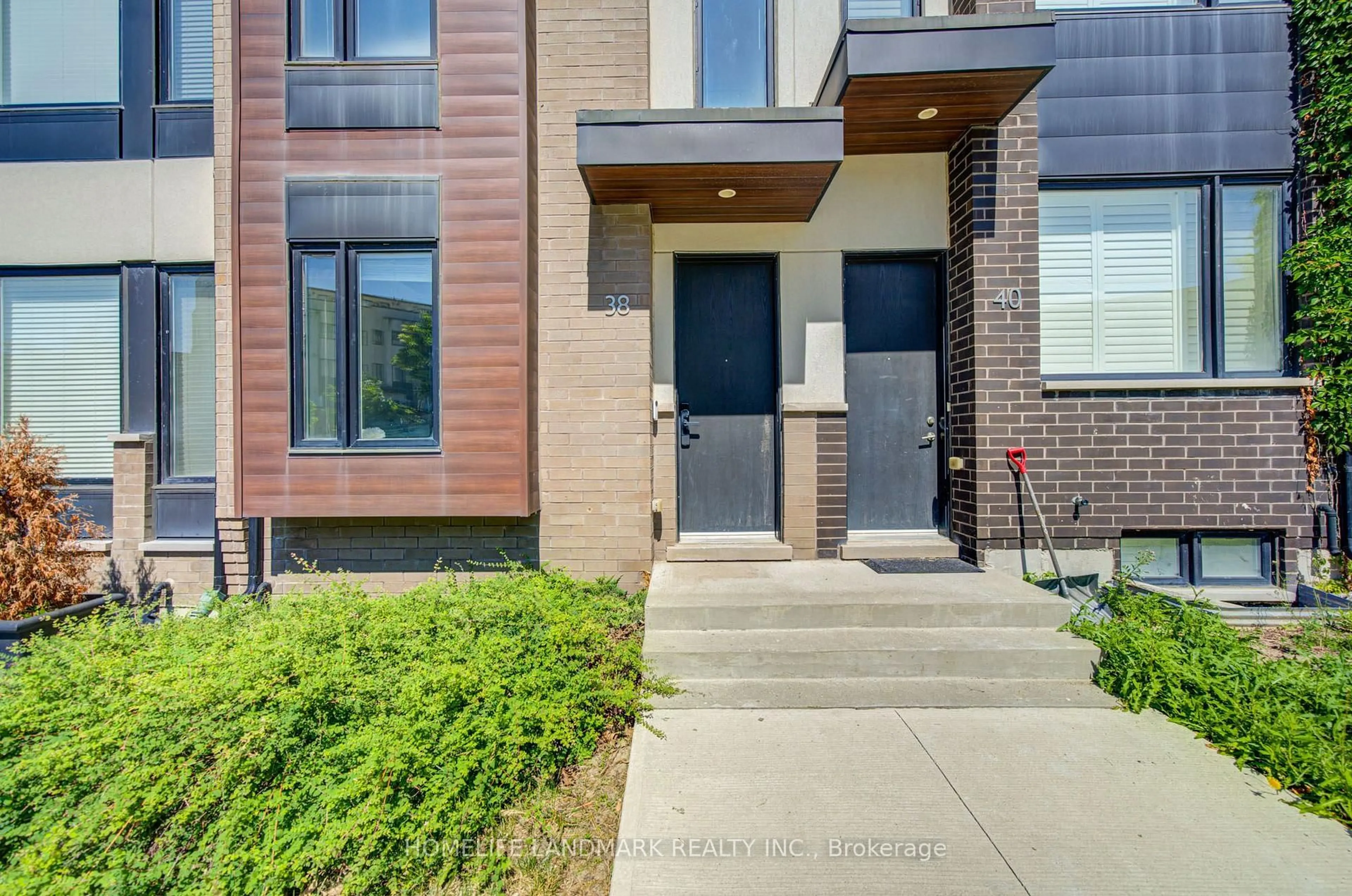Home with brick exterior material, street for 38 Sarah Jackson Cres, Toronto Ontario M3K 0B6