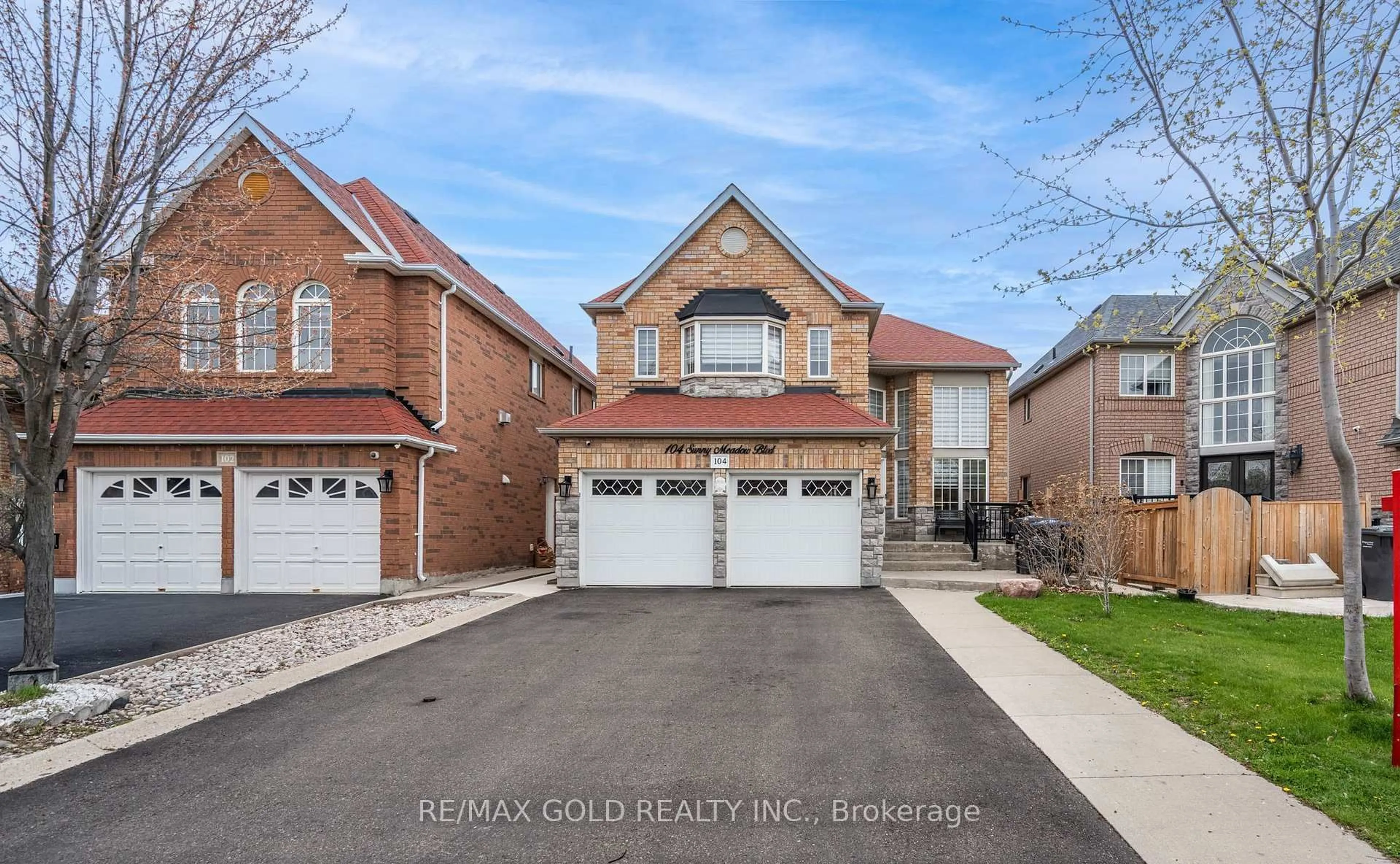 Home with brick exterior material, street for 104 Sunny Meadow Blvd, Brampton Ontario L6R 2C5