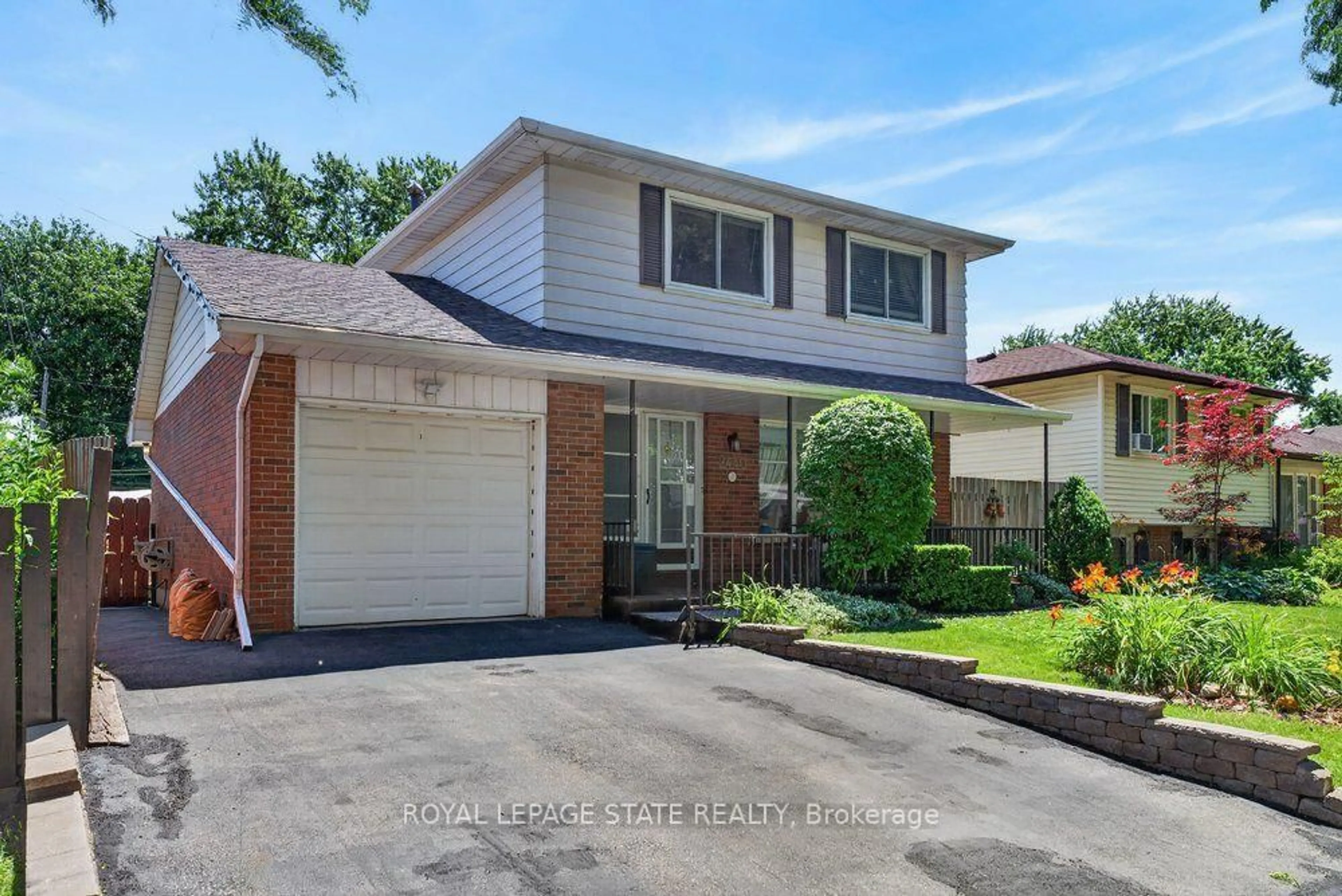Home with brick exterior material, street for 2440 Cyprus Ave, Burlington Ontario L7P 1G6