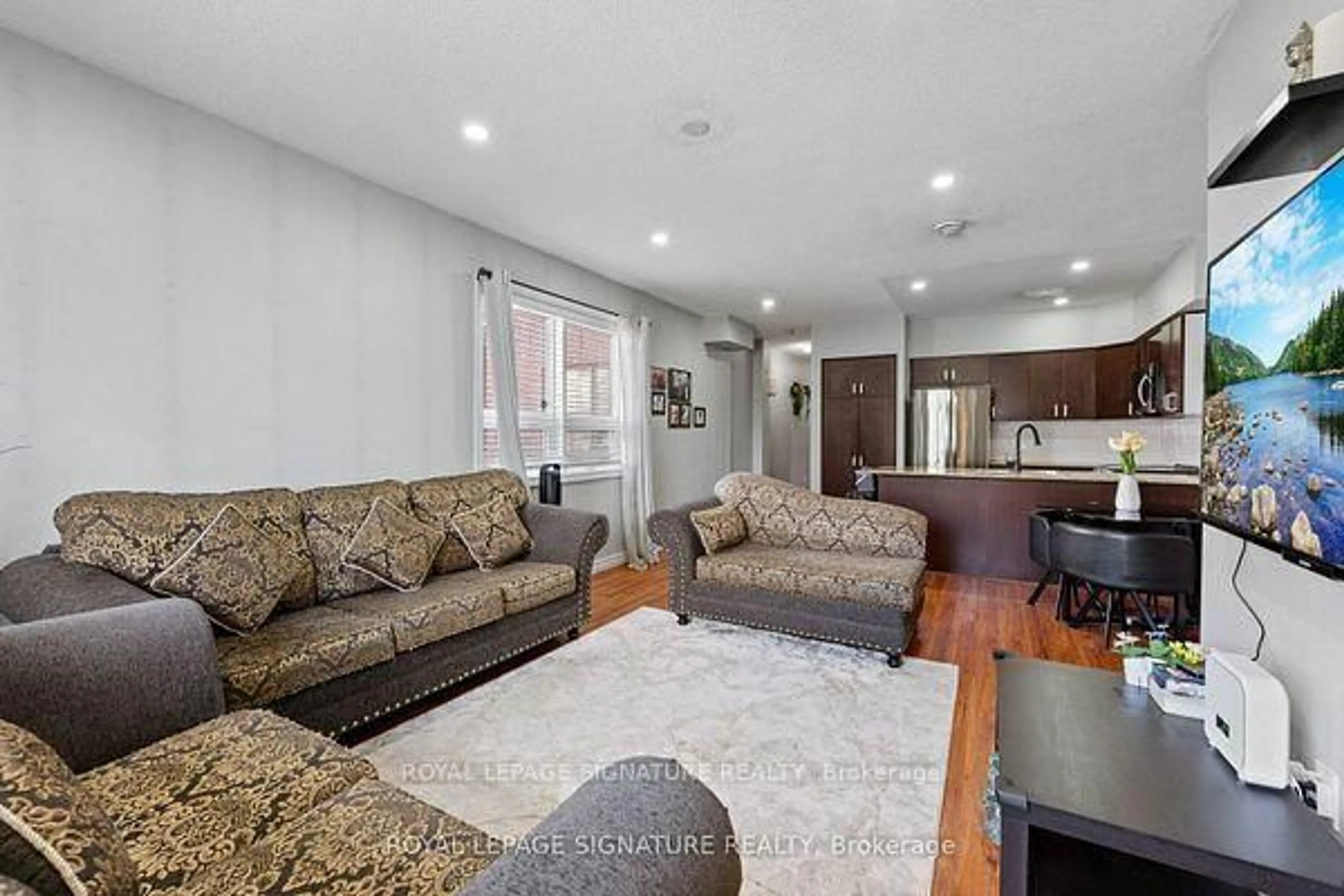Living room with furniture, unknown for 7405 Goreway Dr #104, Mississauga Ontario L4T 0A3