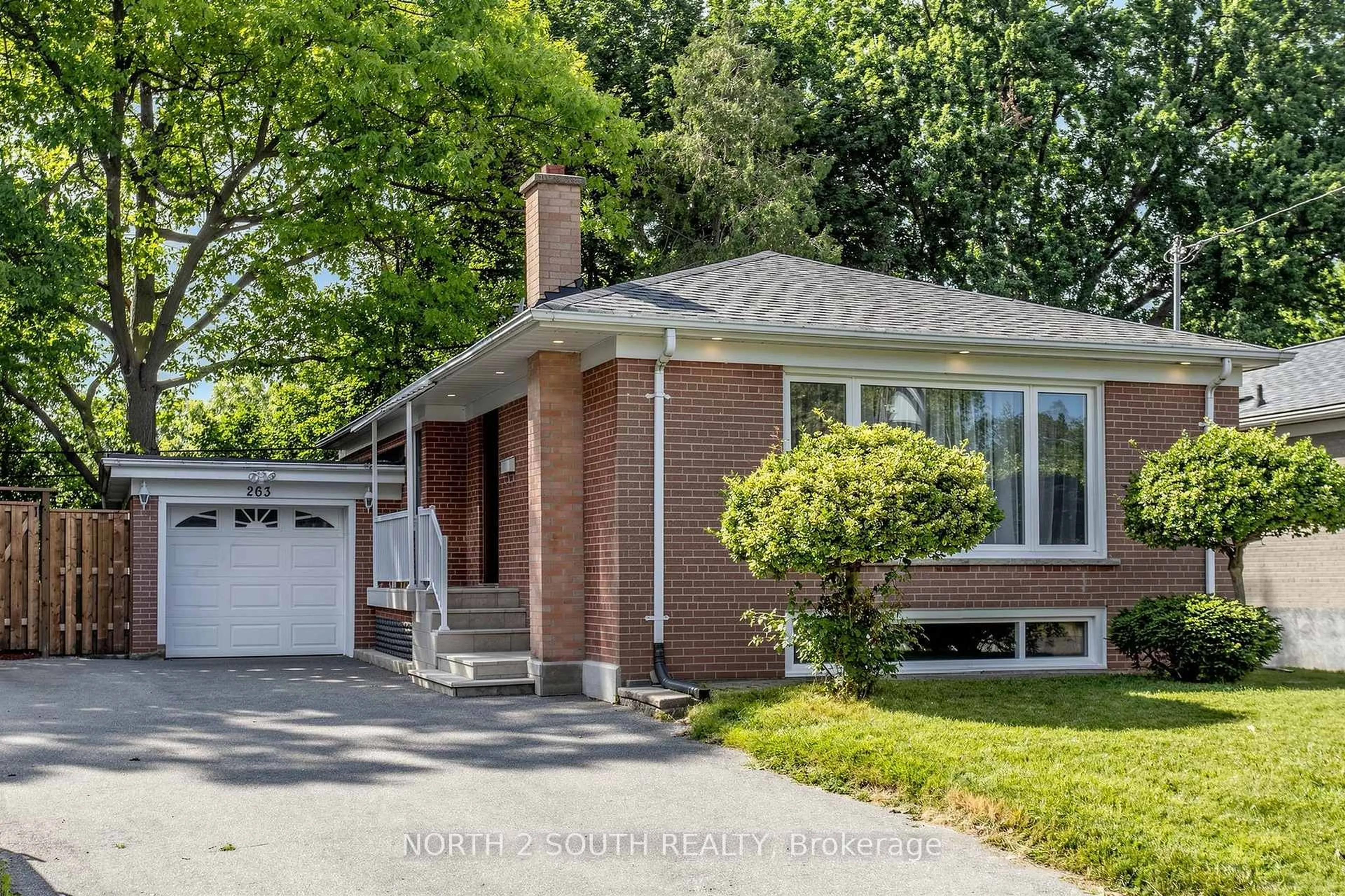 Home with brick exterior material, street for 263 Thistle Down Blvd, Toronto Ontario M9V 1K6