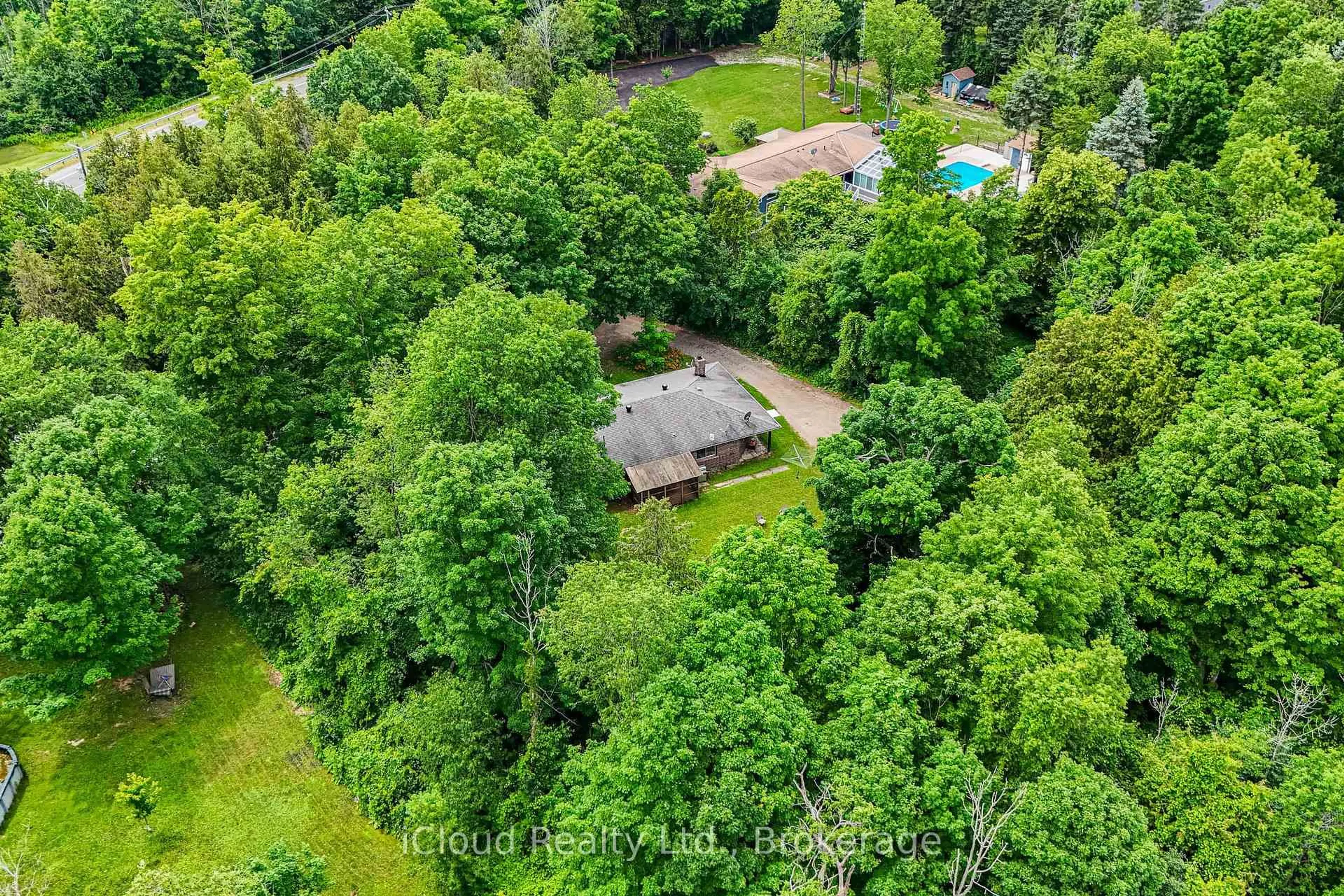 A pic from outside/outdoor area/front of a property/back of a property/a pic from drone, forest/trees view for 14409 Winston Churchill Blvd, Caledon Ontario L7C 1S6