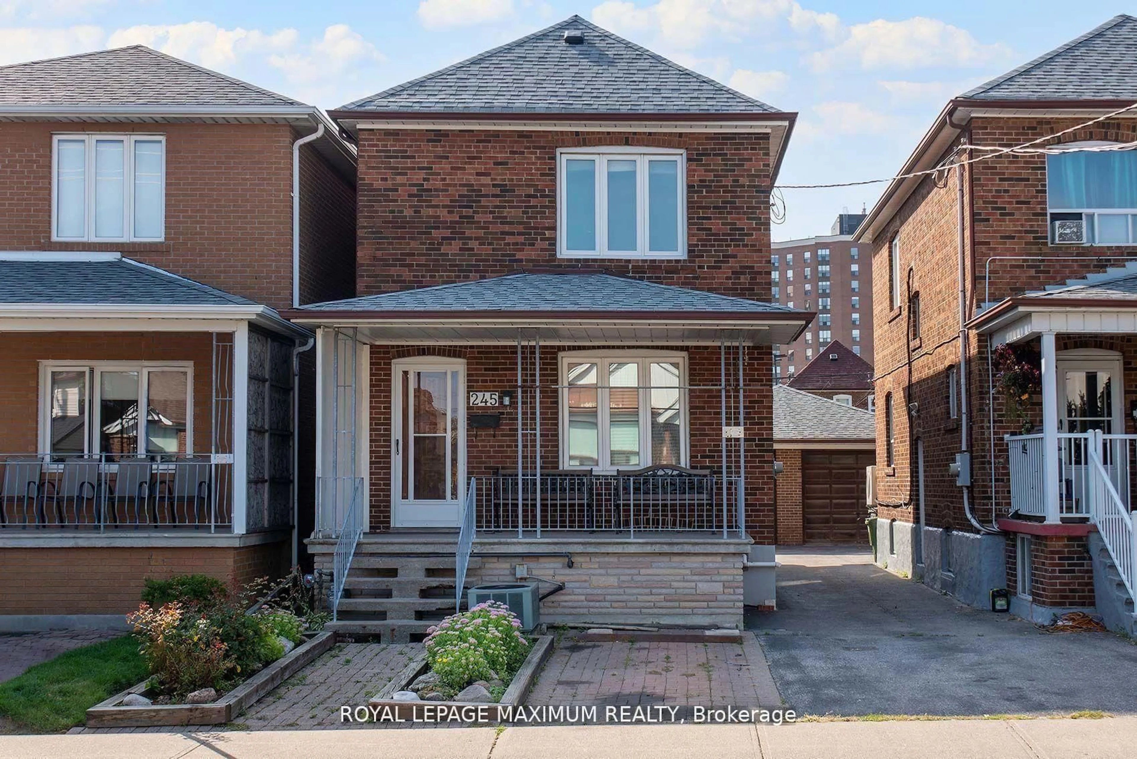 Home with brick exterior material, street for 245 Belgravia Ave, Toronto Ontario M6E 2M9