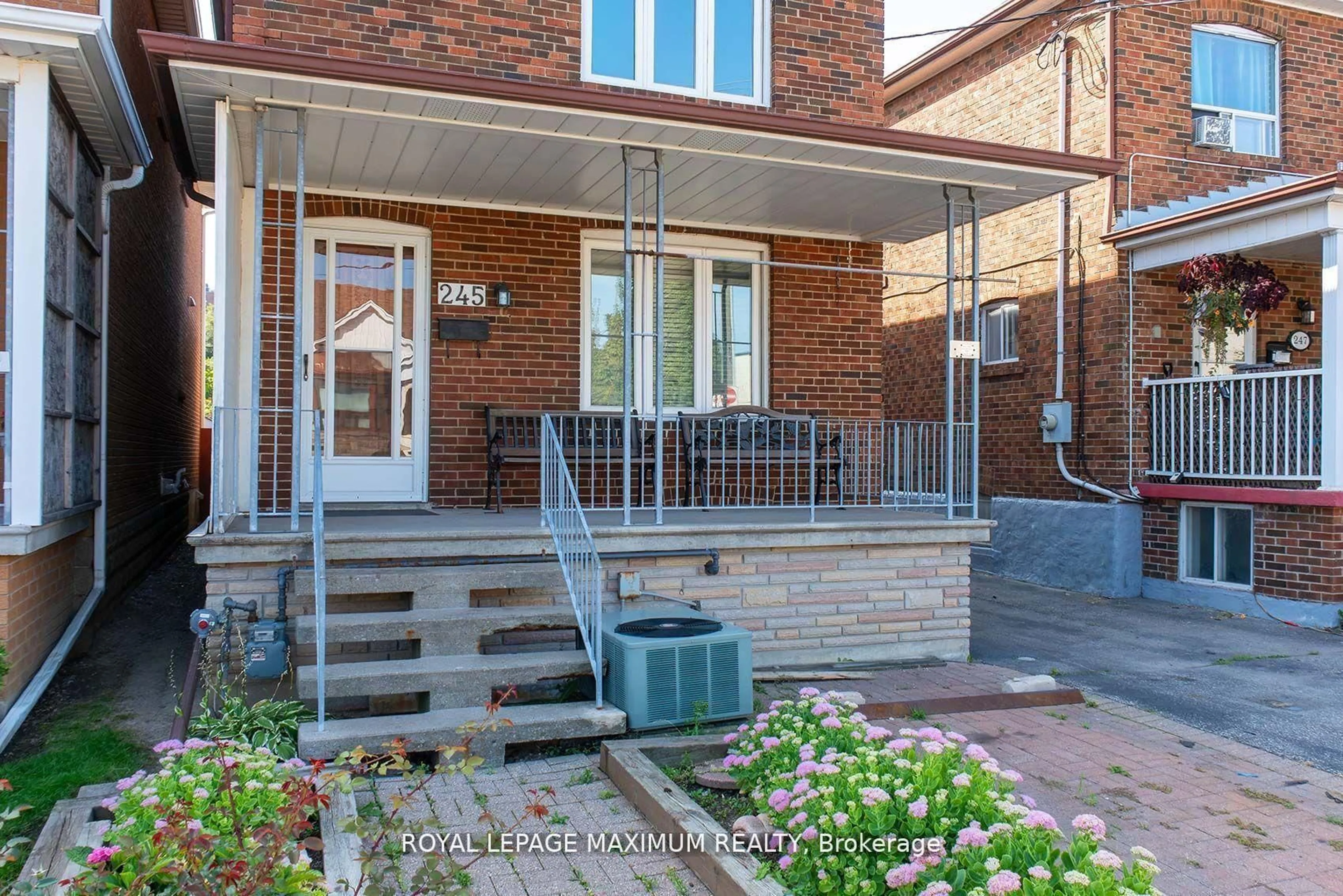 Home with brick exterior material, street for 245 Belgravia Ave, Toronto Ontario M6E 2M9