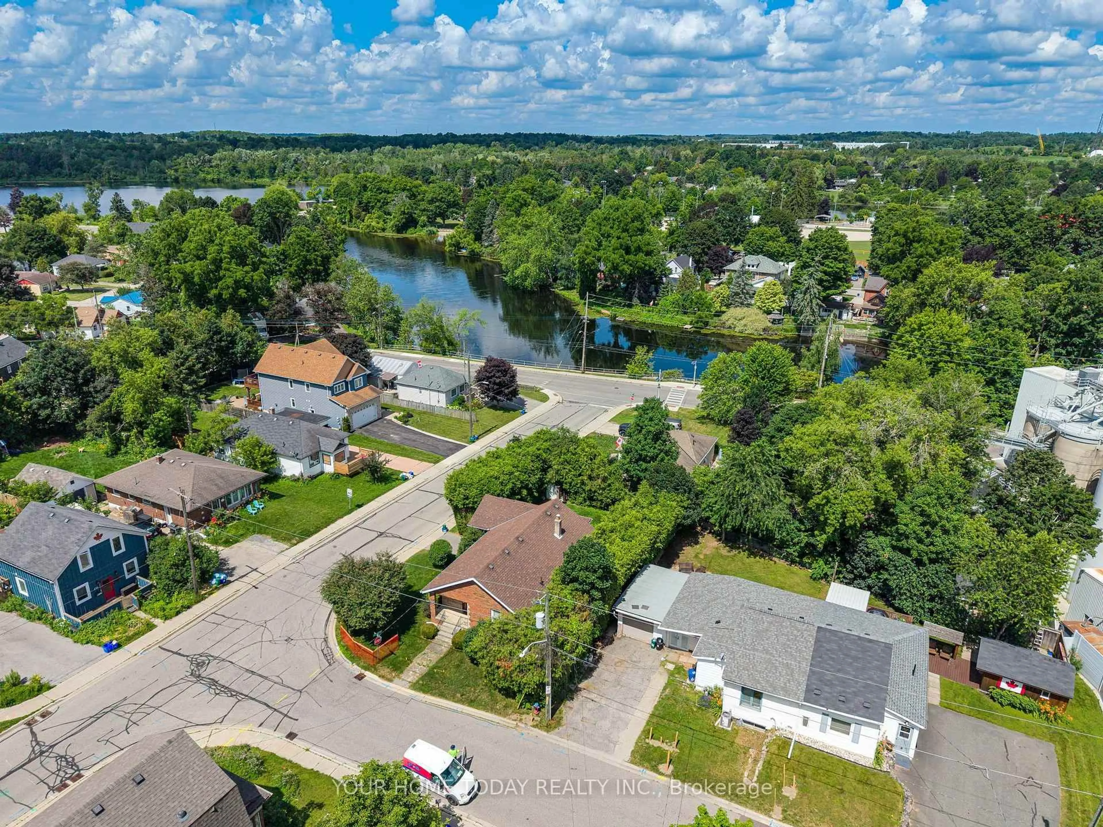 A pic from outside/outdoor area/front of a property/back of a property/a pic from drone, water/lake/river/ocean view for 61 Church St, Halton Hills Ontario L7J 1K1