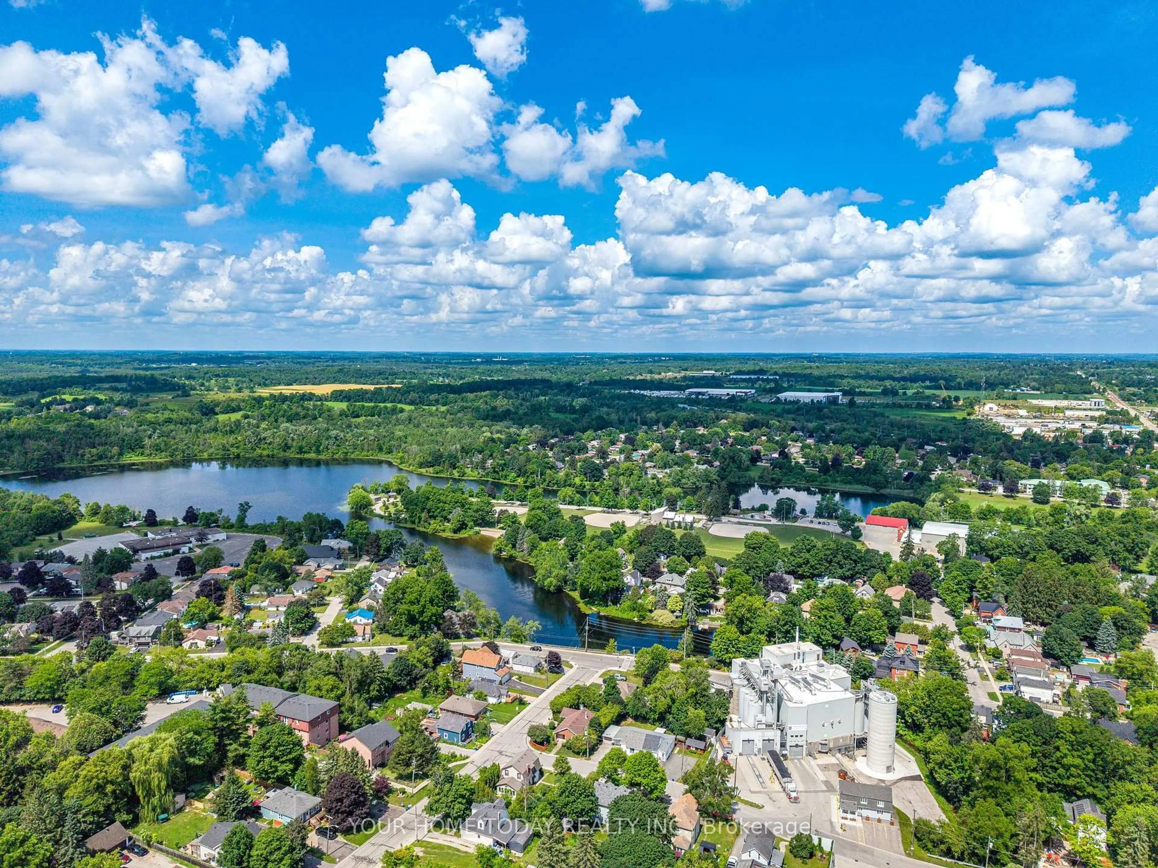 A pic from outside/outdoor area/front of a property/back of a property/a pic from drone, water/lake/river/ocean view for 61 Church St, Halton Hills Ontario L7J 1K1