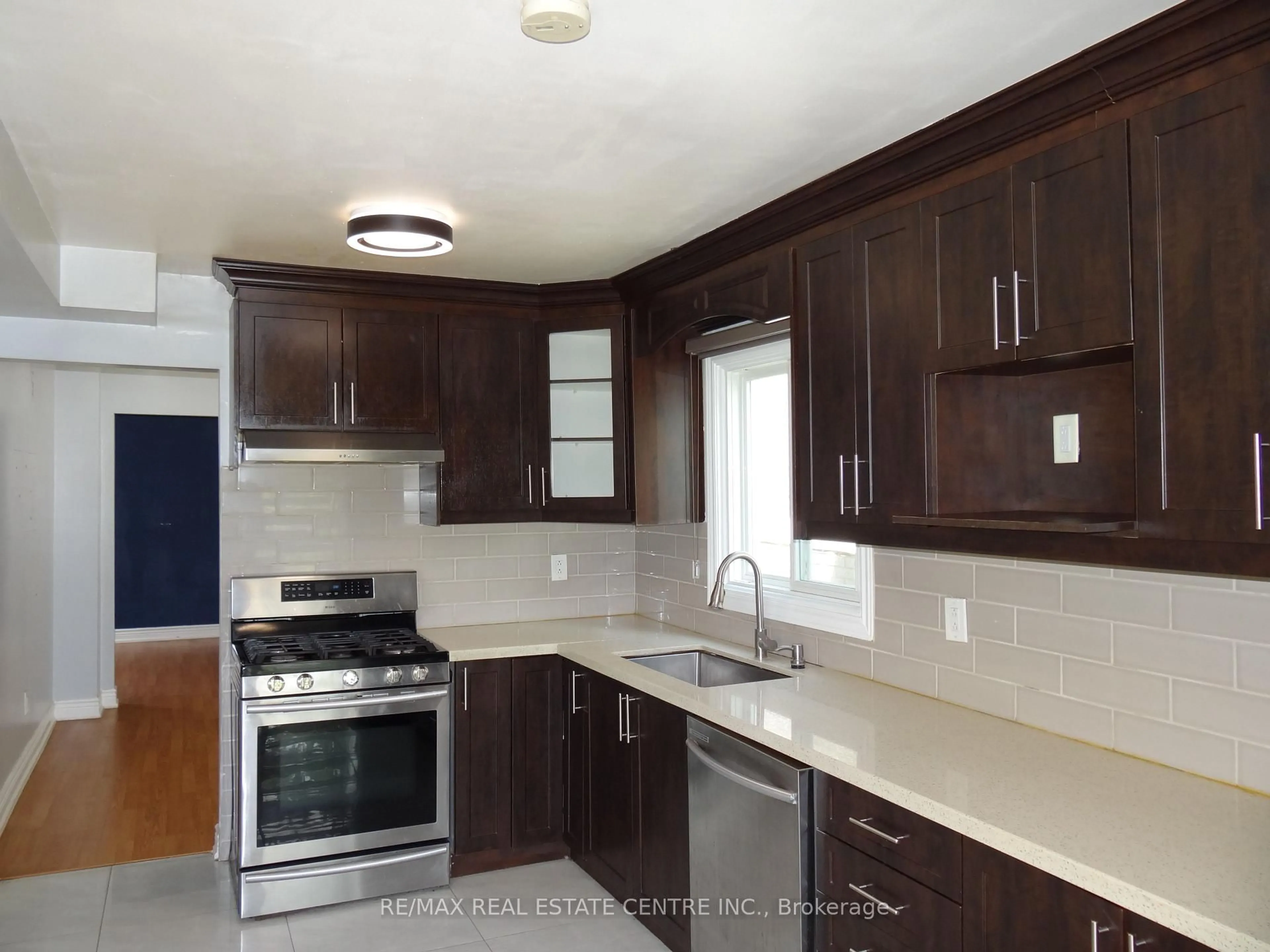 Open concept kitchen, unknown for 57 Meadowlark Dr, Brampton Ontario L6Y 4A3