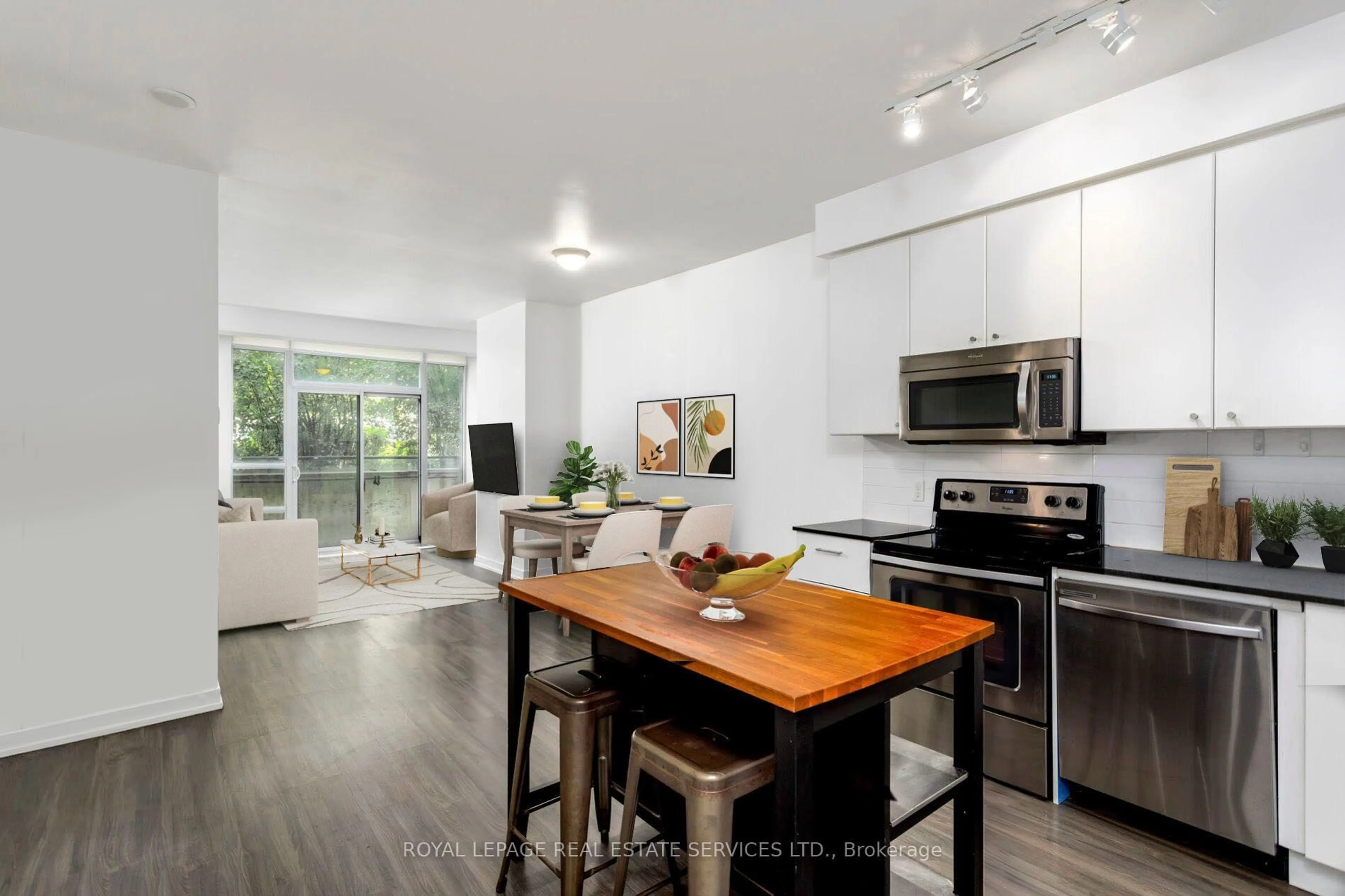 Open concept kitchen, wood/laminate floor for 8 Fieldway Rd #414, Toronto Ontario M8Z 3L1