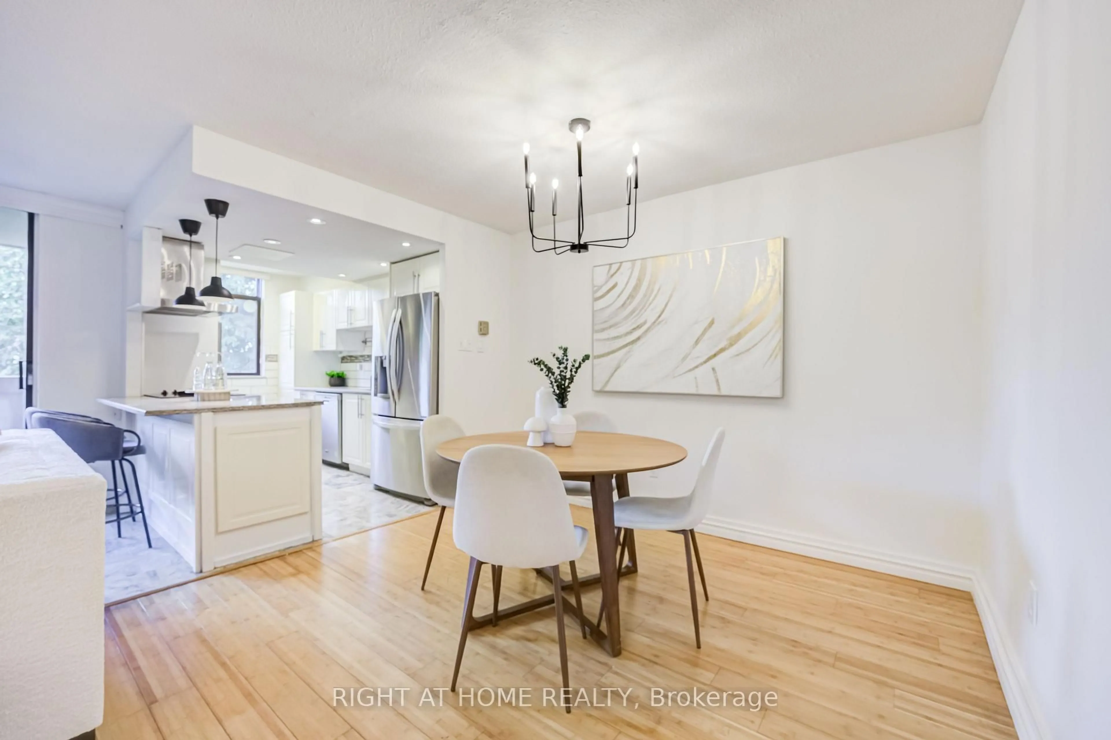 Dining room, wood/laminate floor for 2645 Jane St #426, Toronto Ontario M3L 2J3