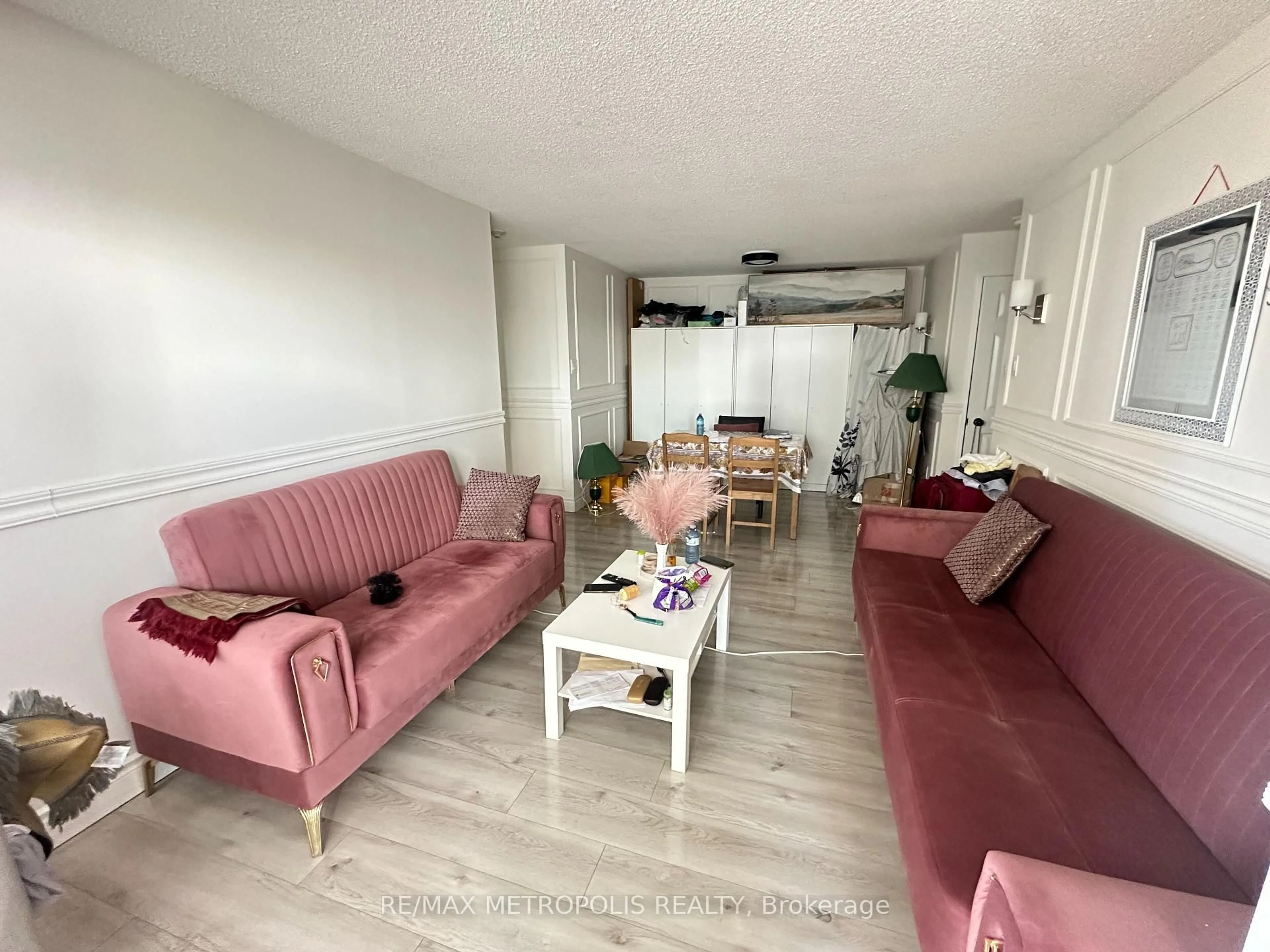 Living room with furniture, unknown for 350 Rathburn Rd #307, Mississauga Ontario L5B 3Y2