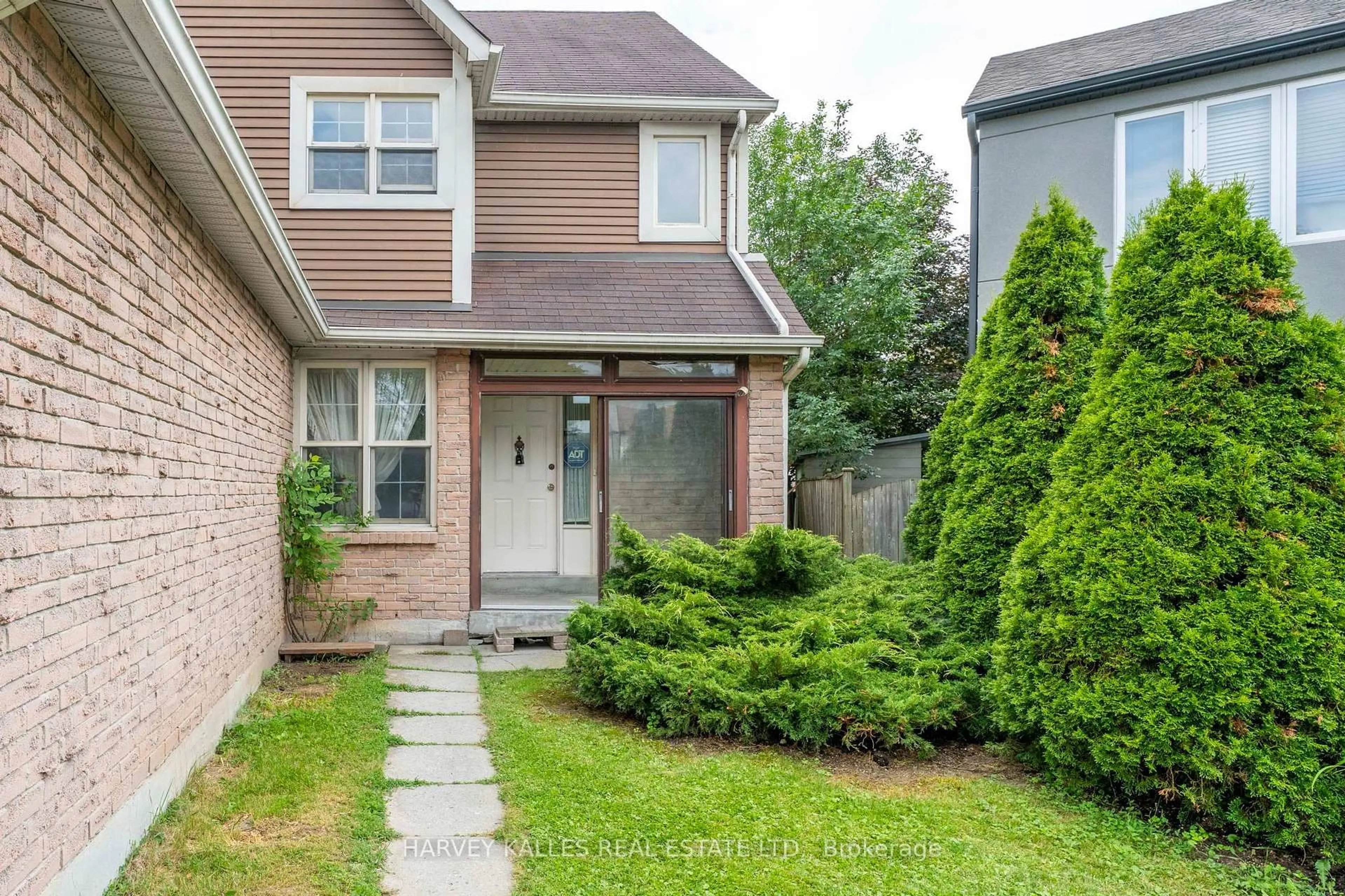 Home with brick exterior material, street for 39 Newington Cres, Toronto Ontario M9C 5B7