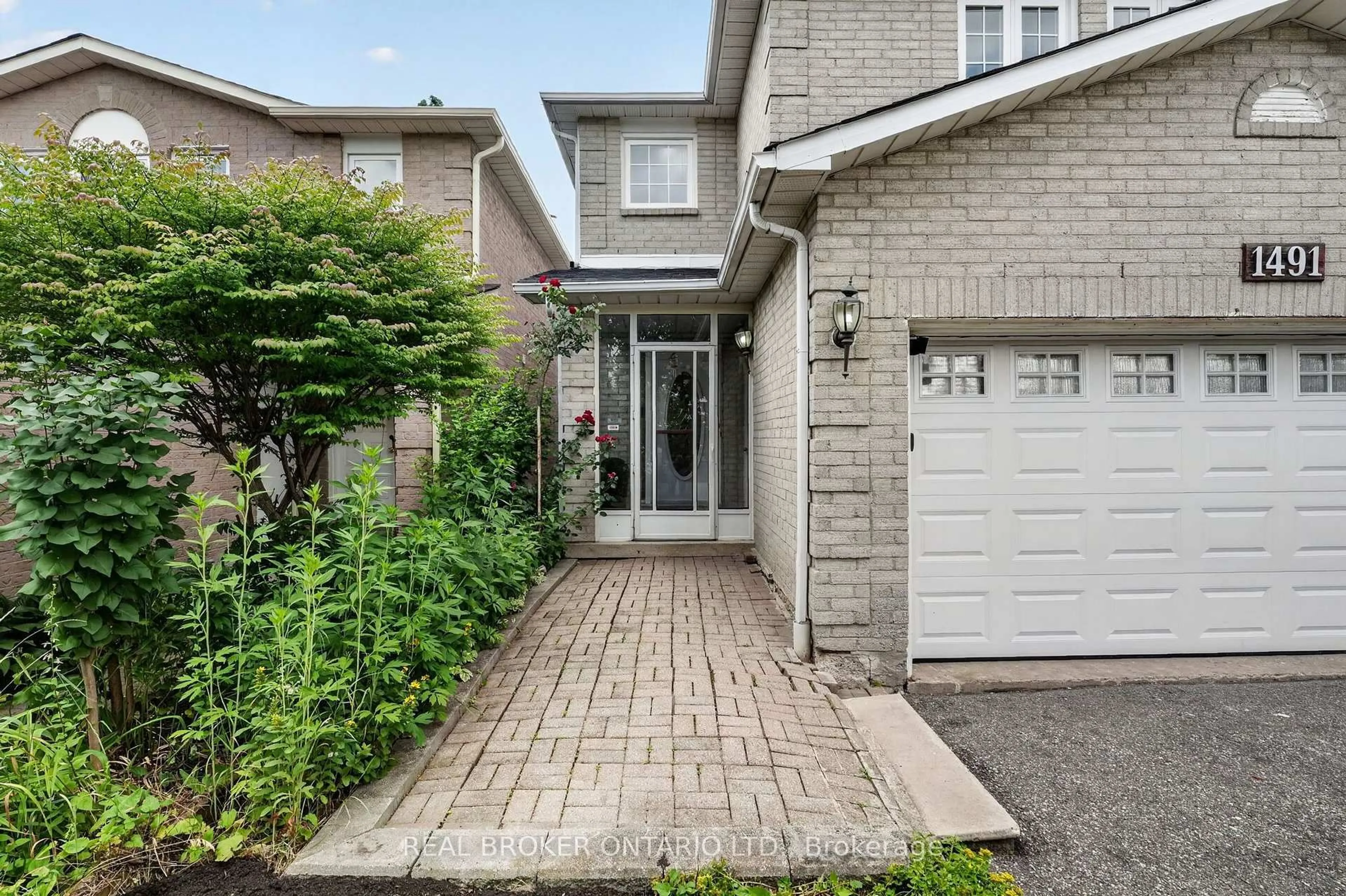 Home with brick exterior material, street for 1491 Evenside Cres, Mississauga Ontario L5M 3Y3