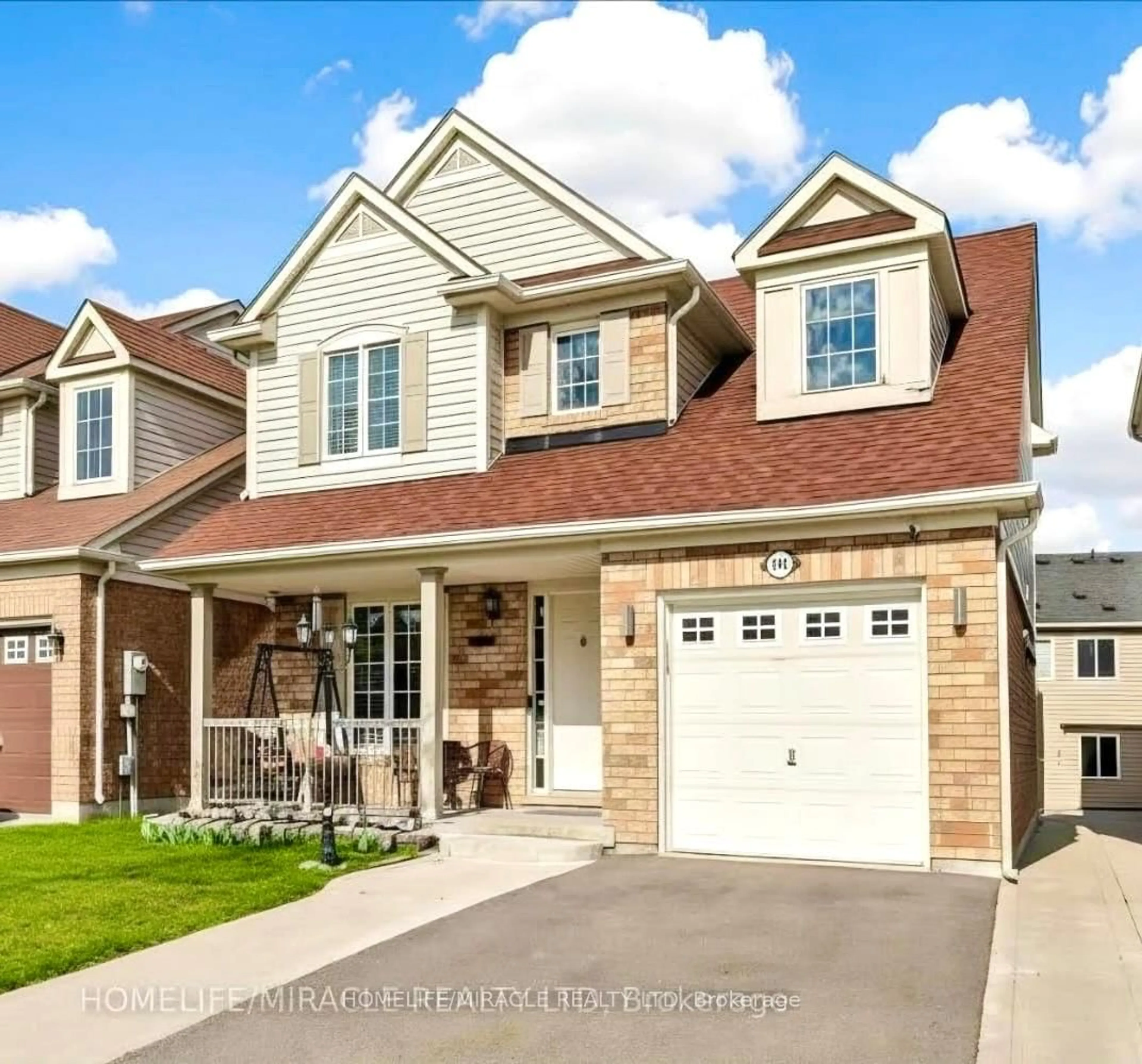 Home with brick exterior material, street for 361 Brisdale Dr, Brampton Ontario L7A 3M6