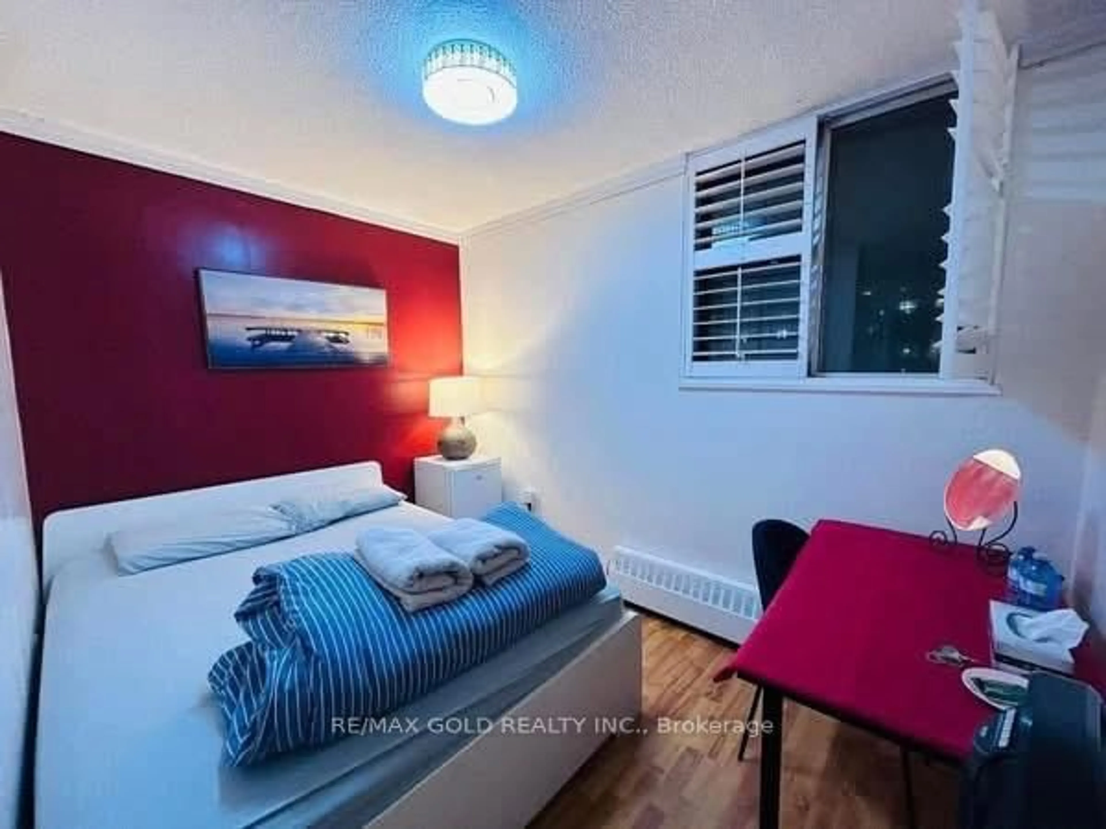Bedroom with bed, wood/laminate floor for 50 Lotherton Ptwy #815, Toronto Ontario M6B 2G8