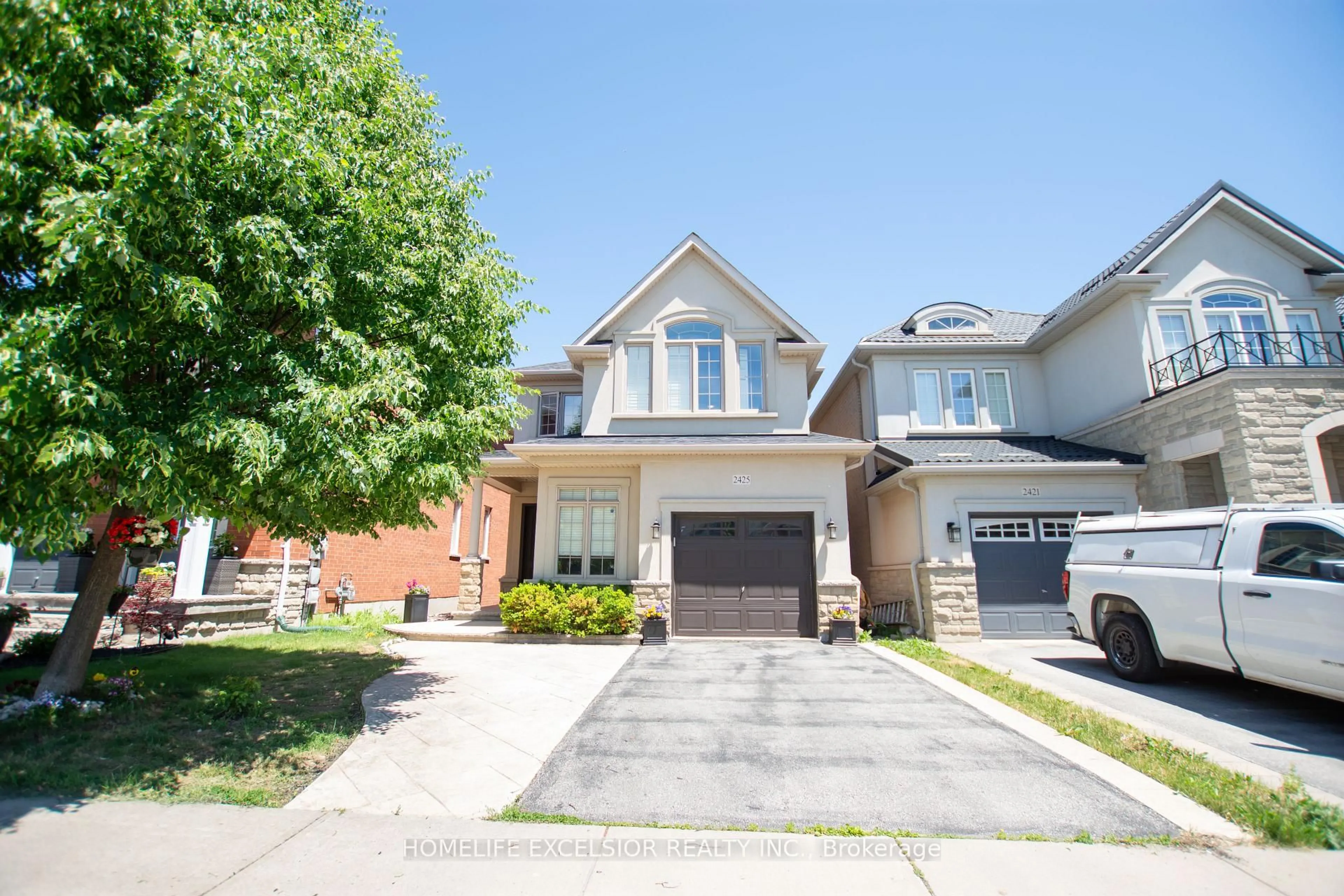 Home with brick exterior material, street for 2425 QUETICO Cres, Oakville Ontario L6M 0R4