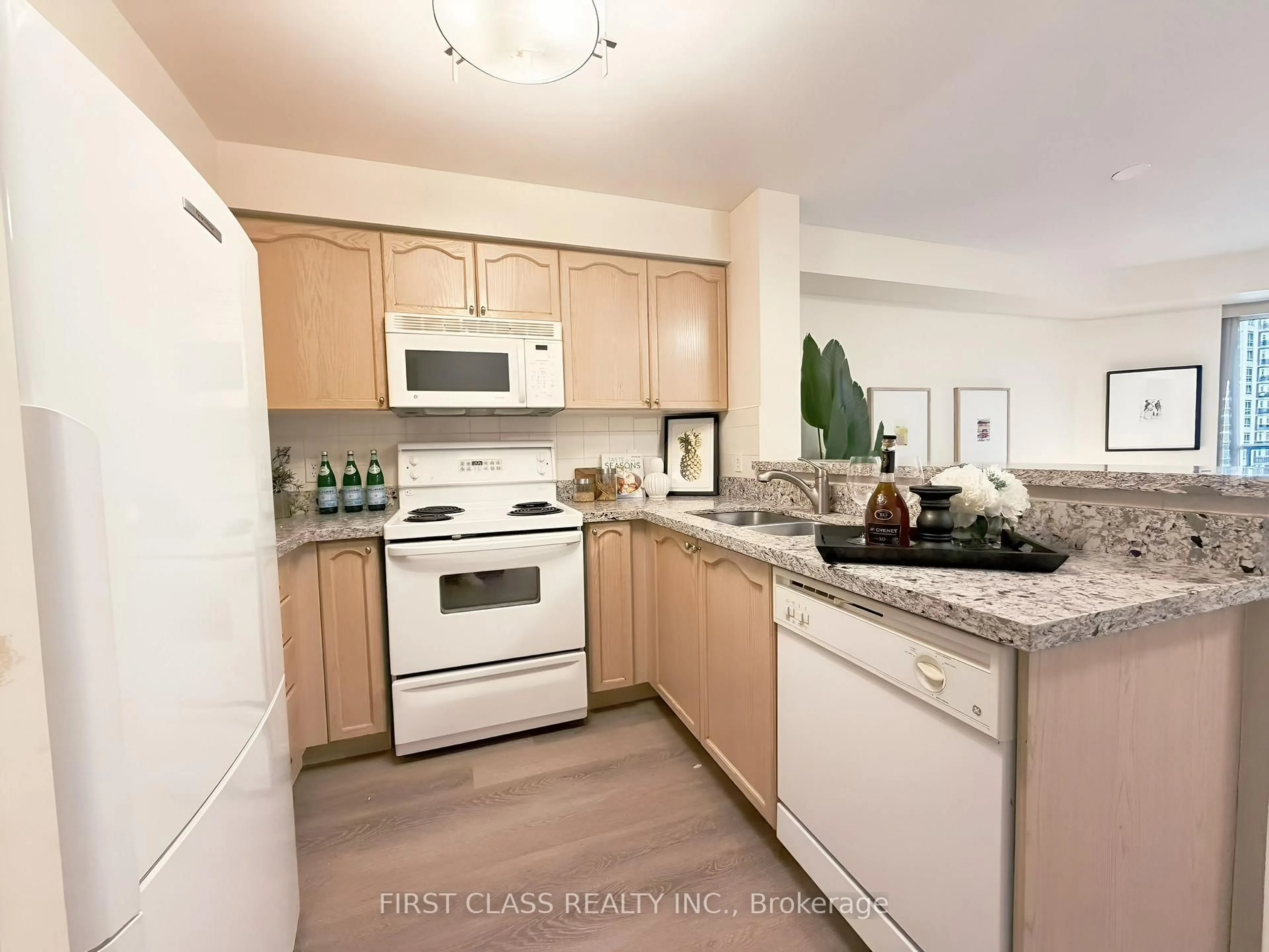 Standard kitchen, unknown for 11 Michael Power Pl #715, Toronto Ontario M9A 5G3