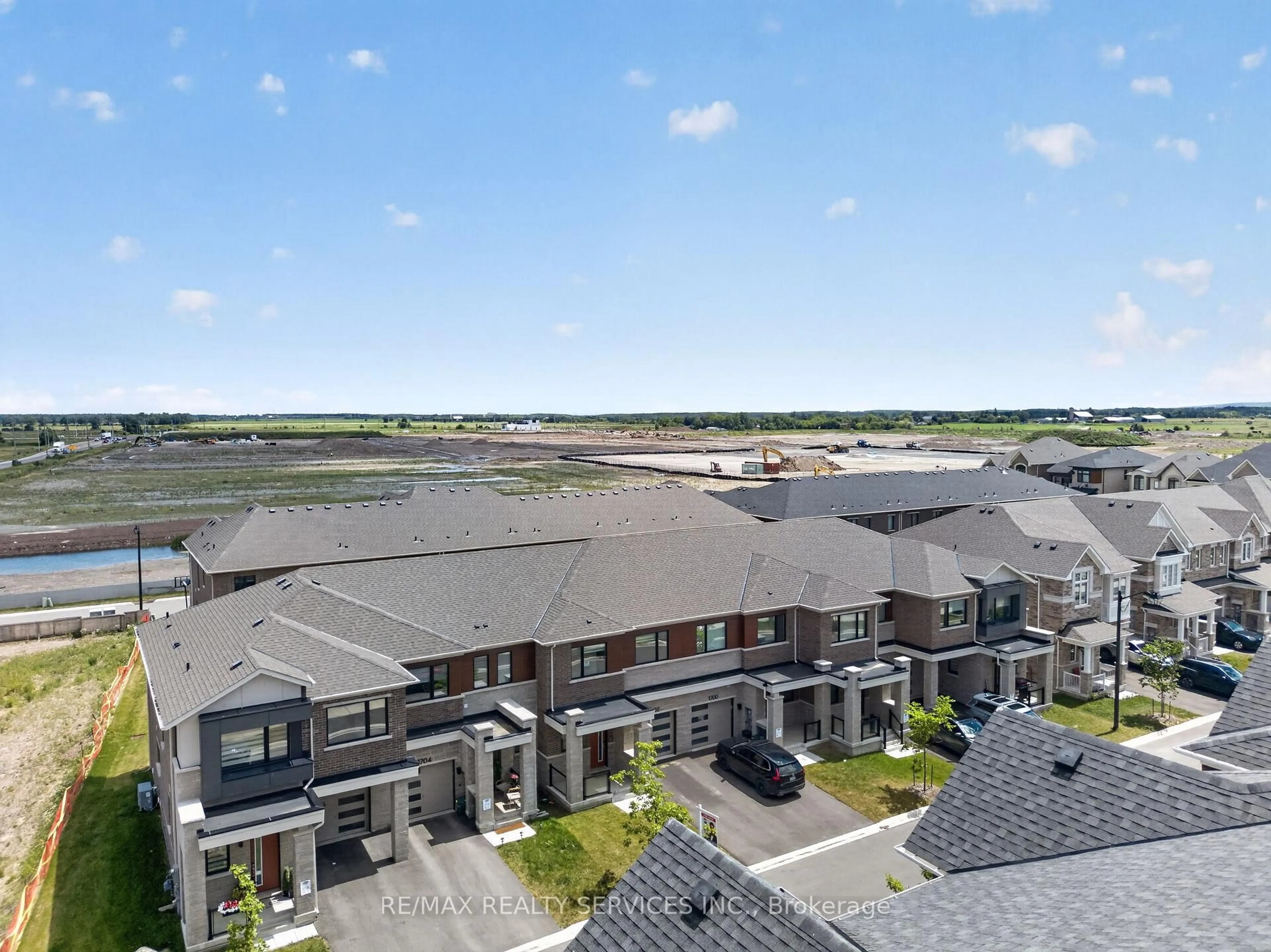 A pic from outside/outdoor area/front of a property/back of a property/a pic from drone, water/lake/river/ocean view for 1702 Dance Crt, Milton Ontario L9E 2A3