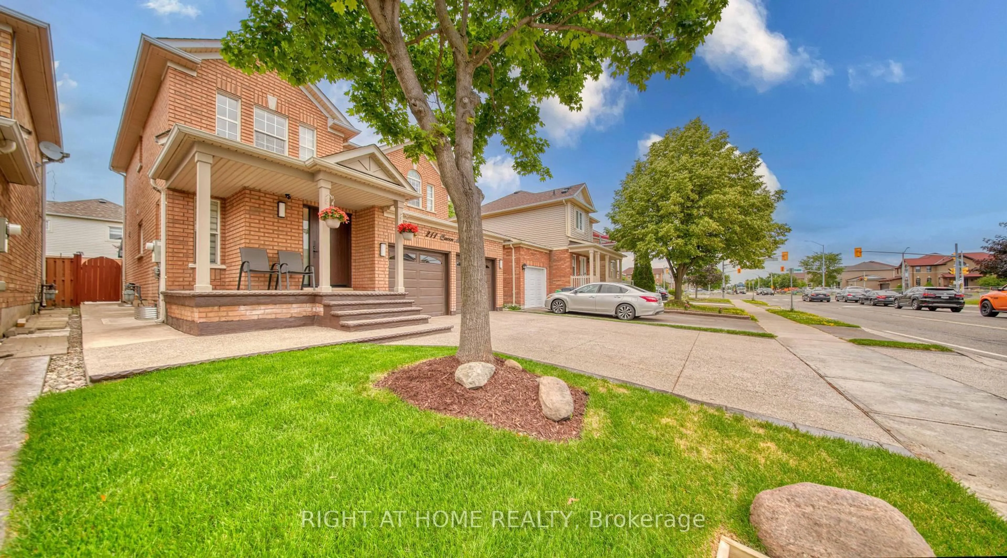 Home with brick exterior material, street for 211 Queen Mary Dr, Brampton Ontario L7A 1Y9
