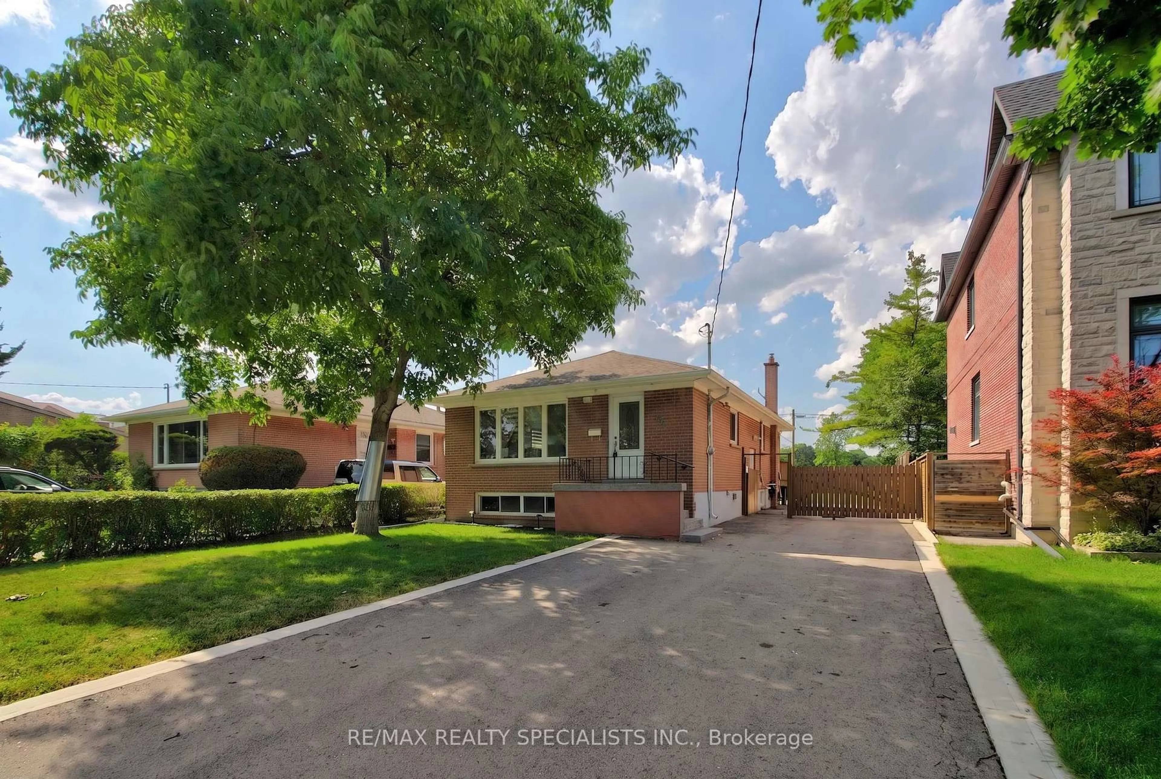 Home with brick exterior material, street for 94 Eringate Dr, Toronto Ontario M9C 3Z6